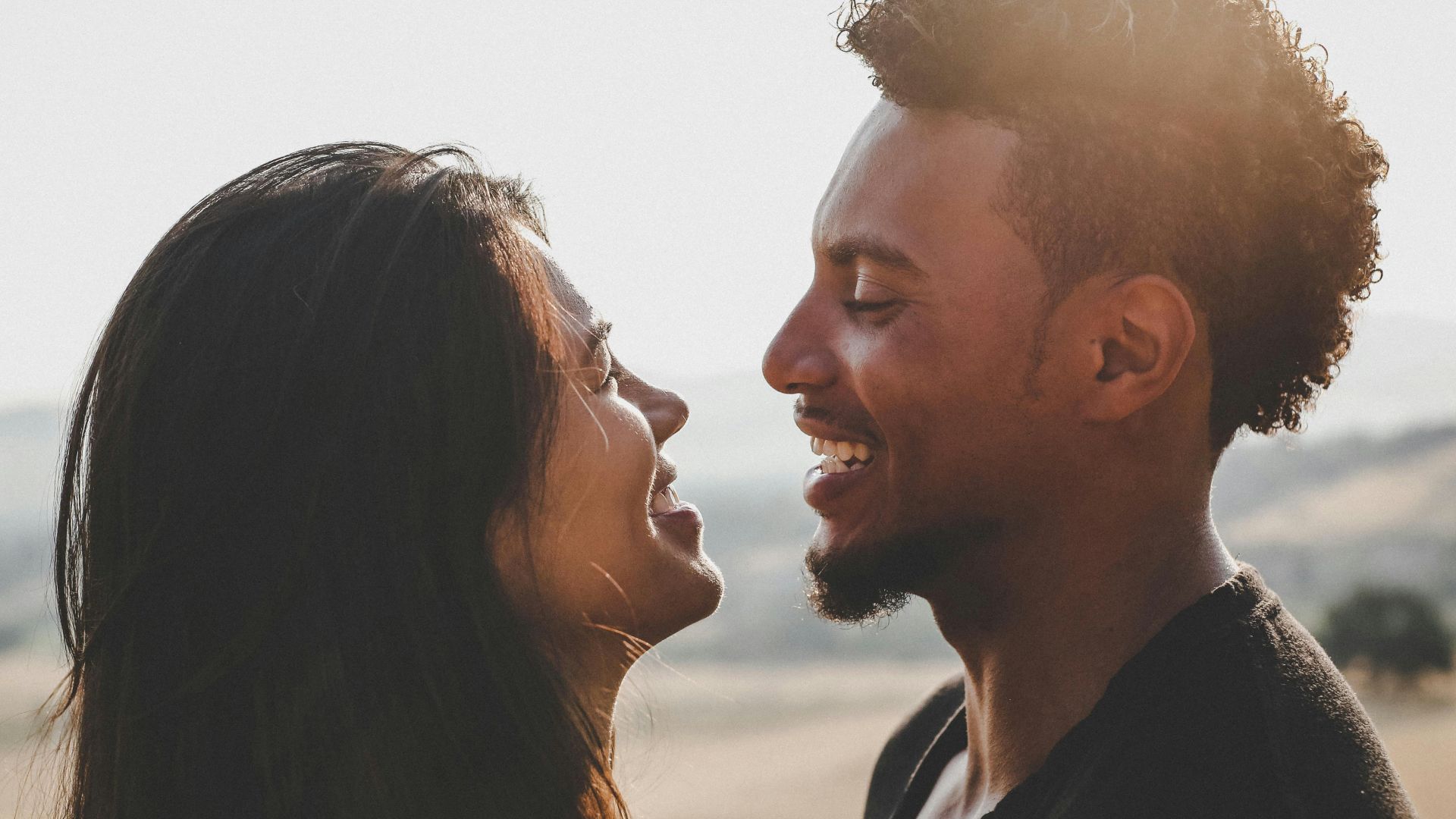 man and woman facing