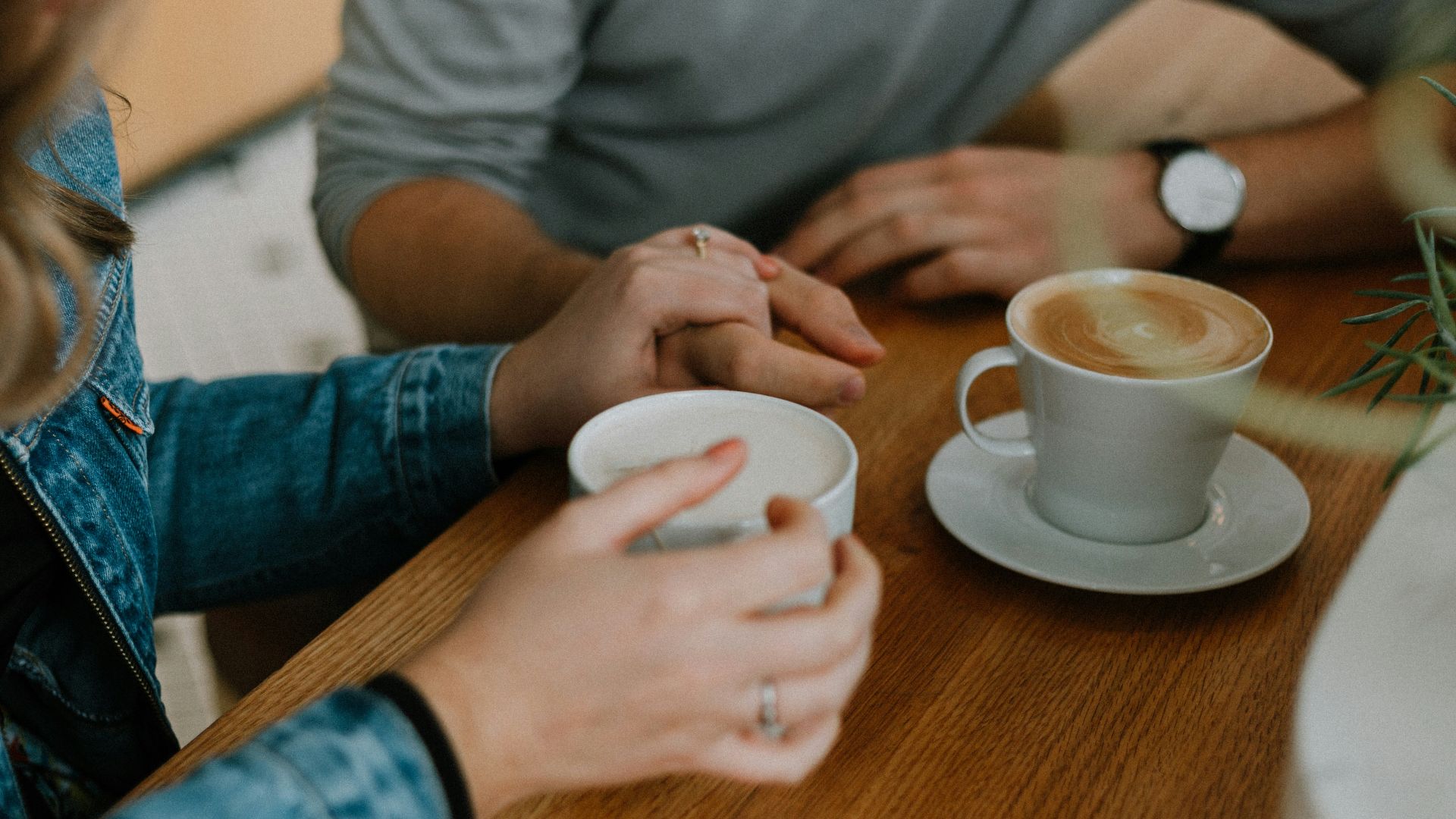 two mugs with coffee on table