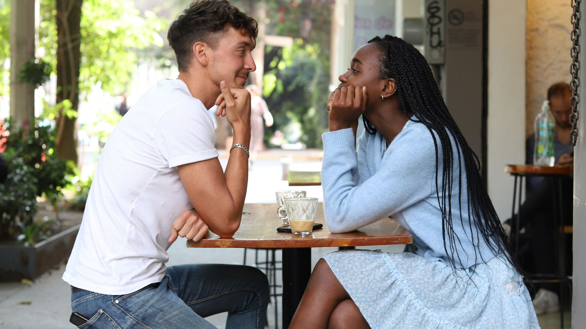 a man and a woman sitting at a table