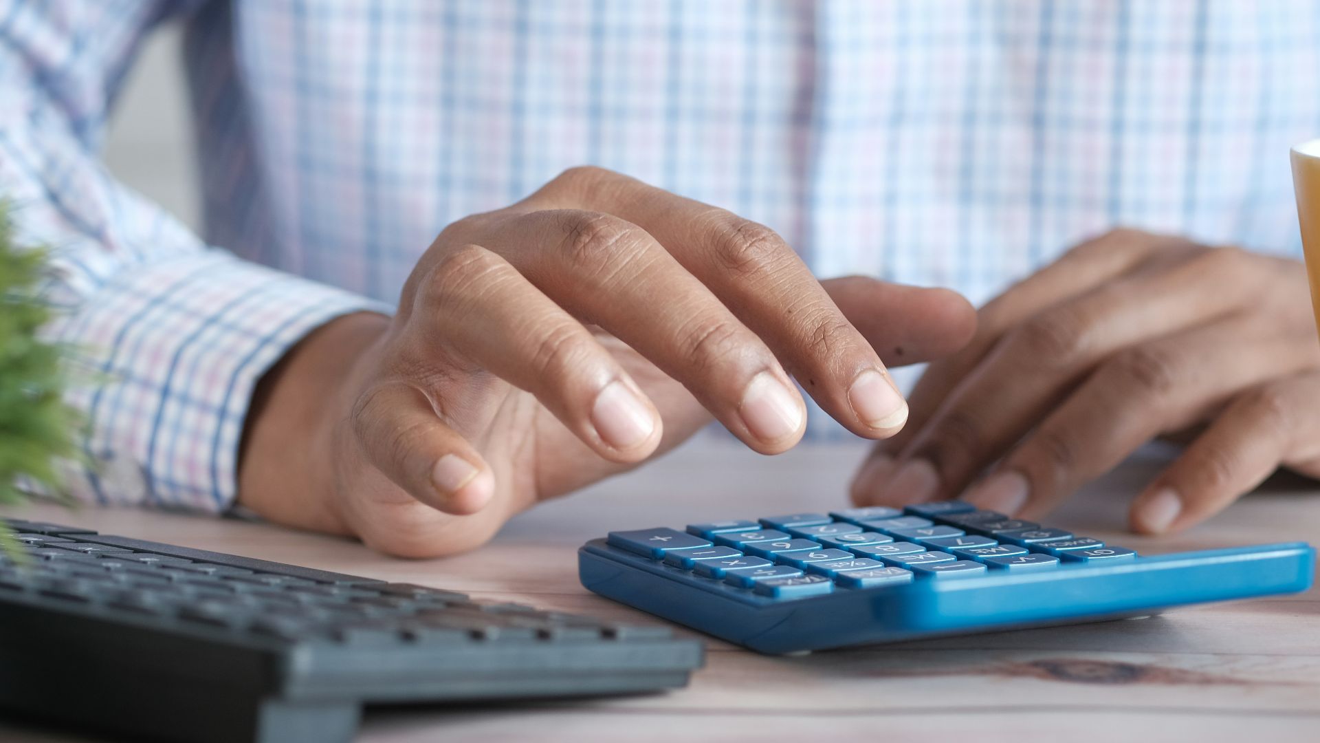 person using black computer keyboard