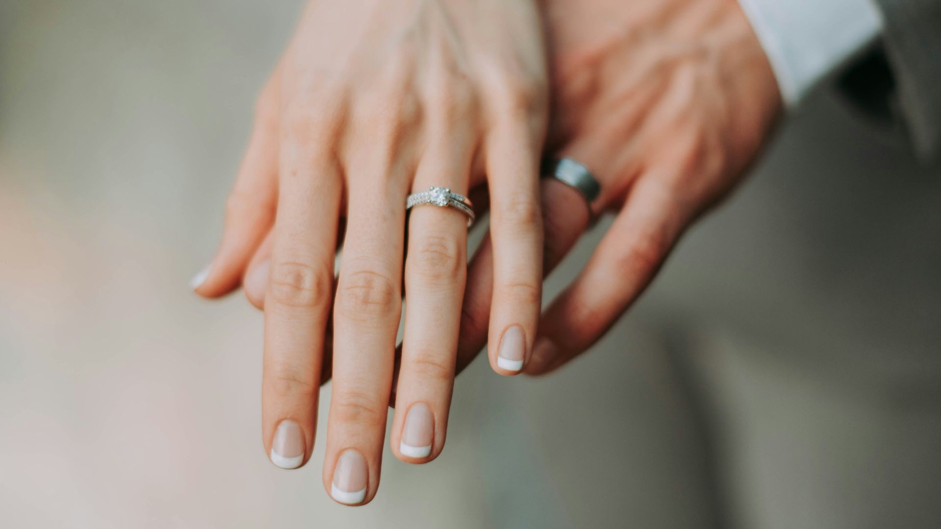 woman touch man's hand