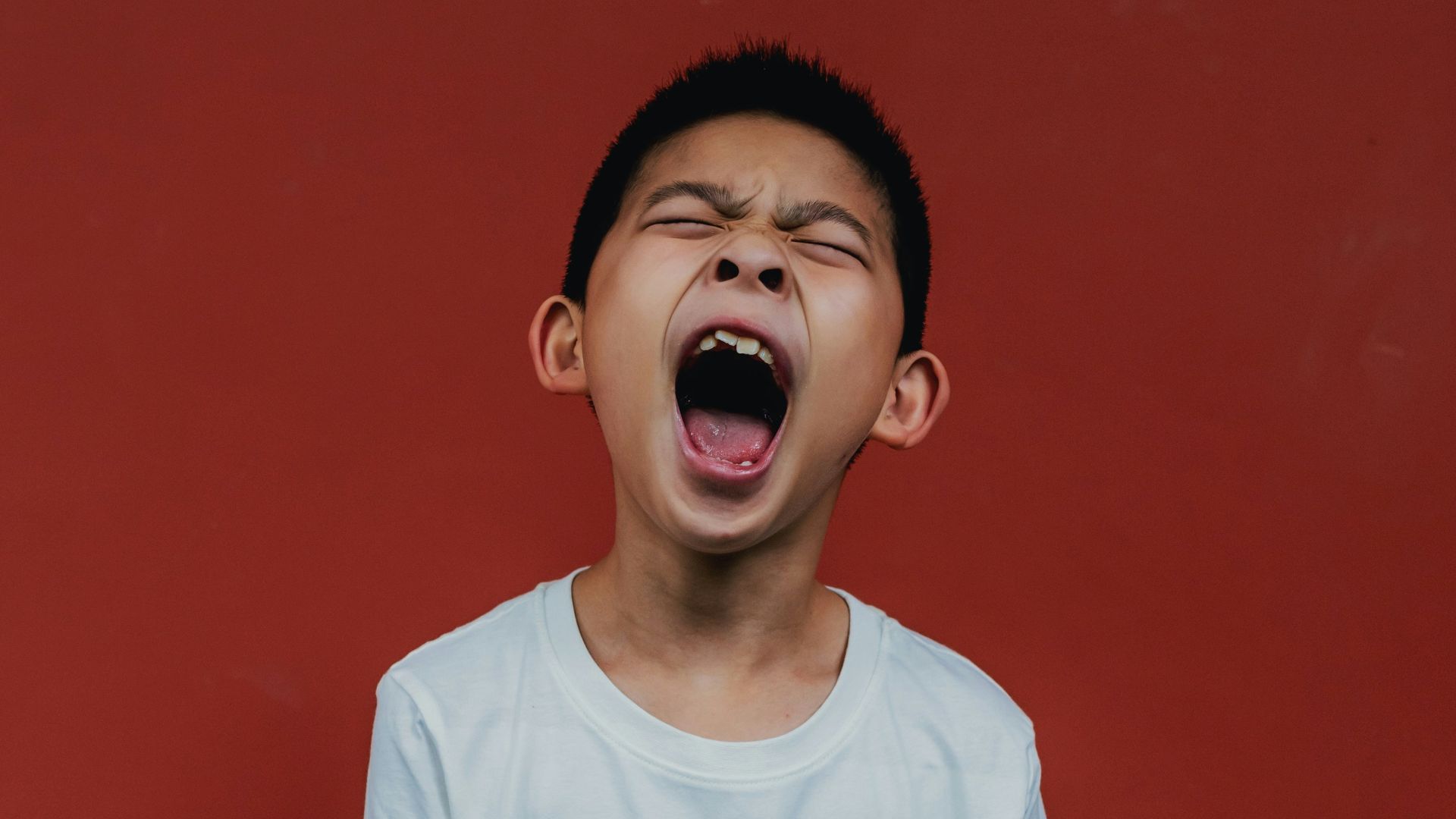 boy in white crew neck t-shirt