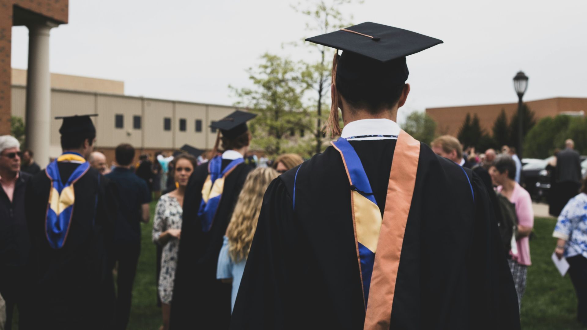 man wearing academic gown