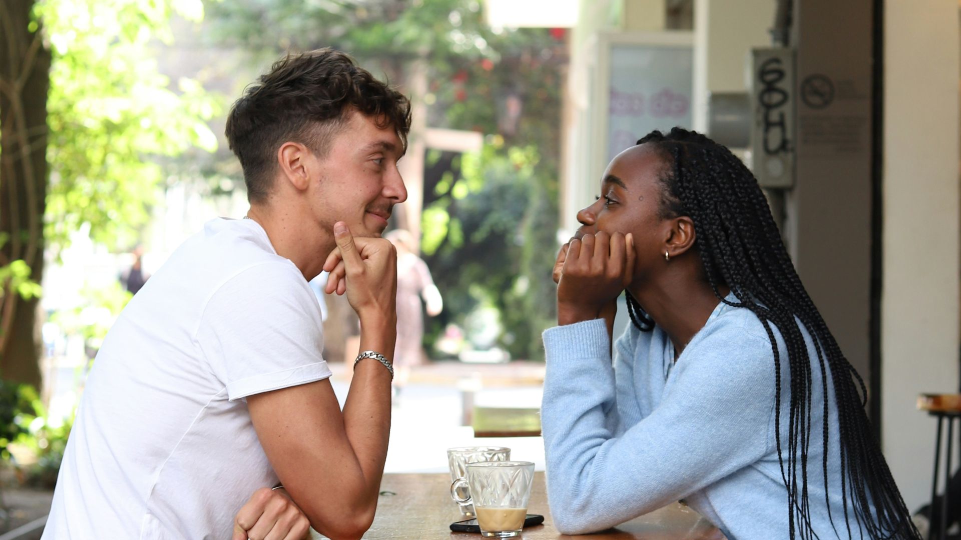 a man and a woman sitting at a table