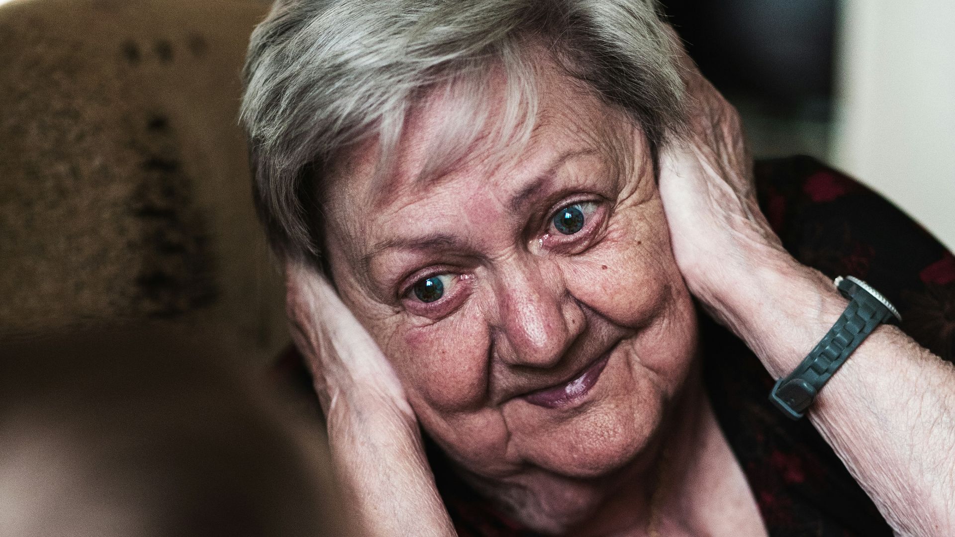 woman covering her ears photo