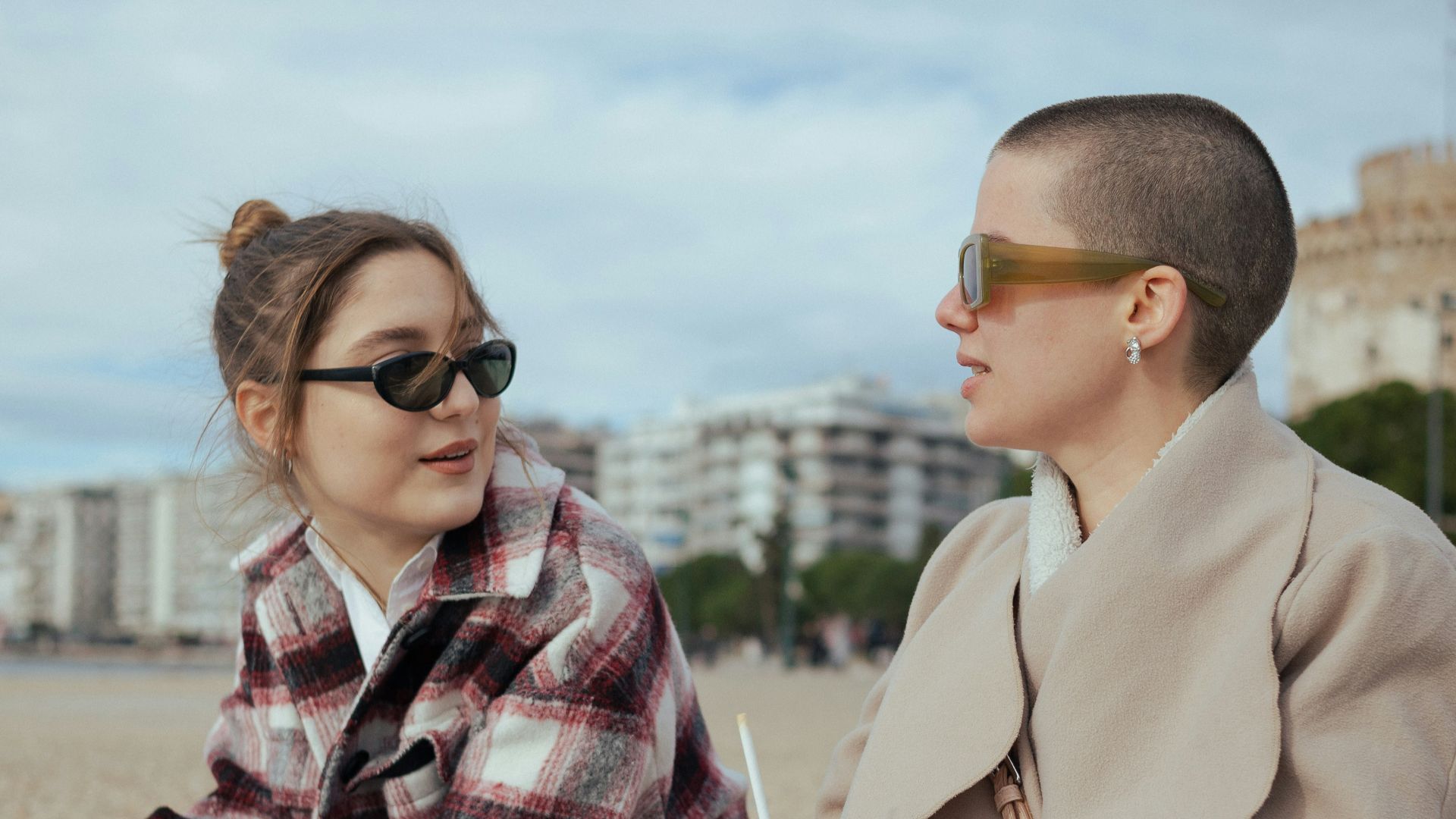a man and a woman sitting next to each other