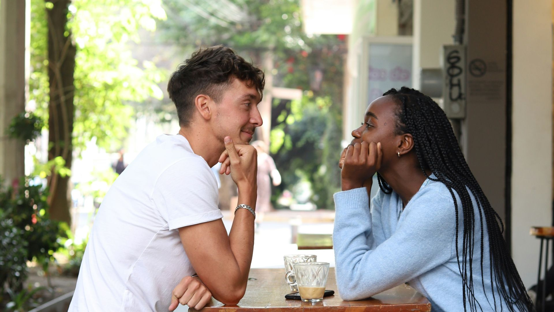 a man and a woman sitting at a table