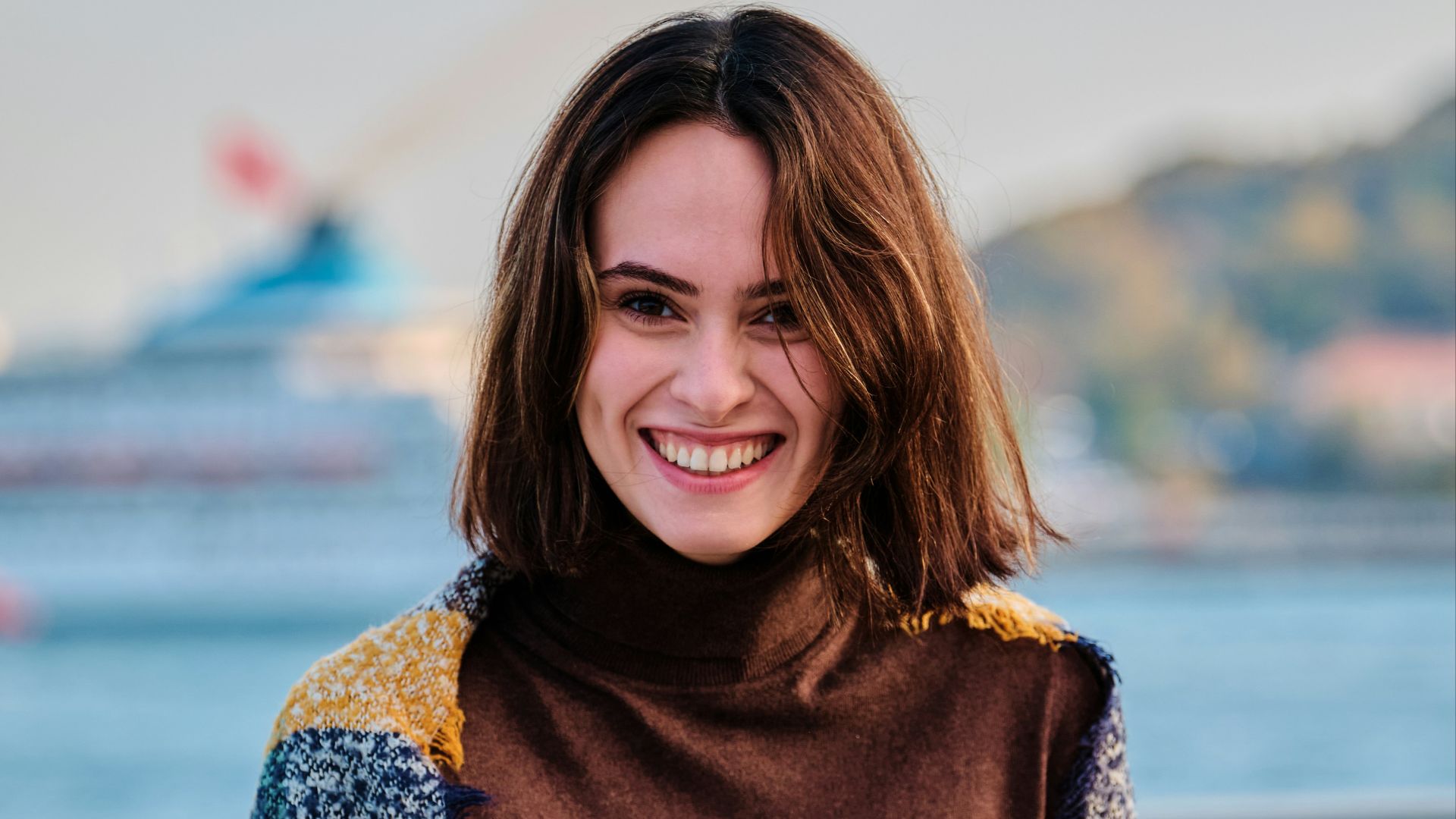 woman in brown scarf and brown scarf