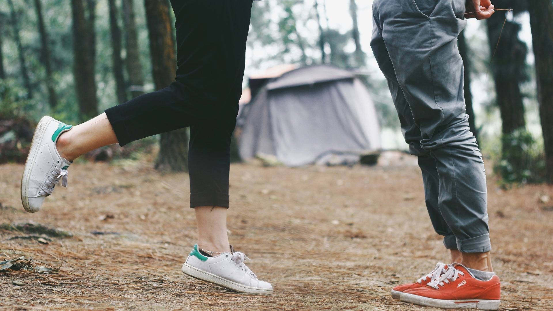person's standing on brown sand during daytime