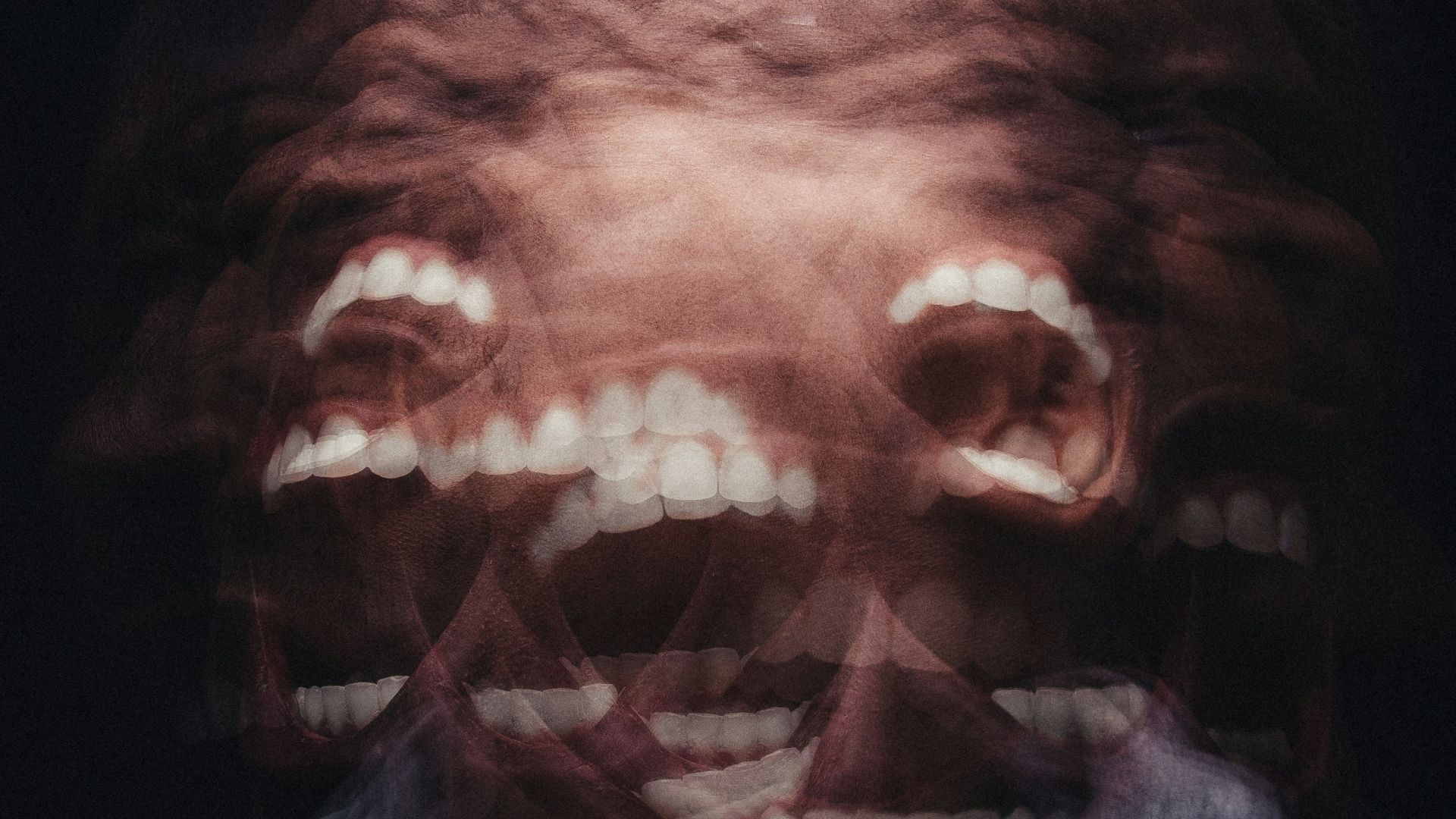 mans face with white scarf