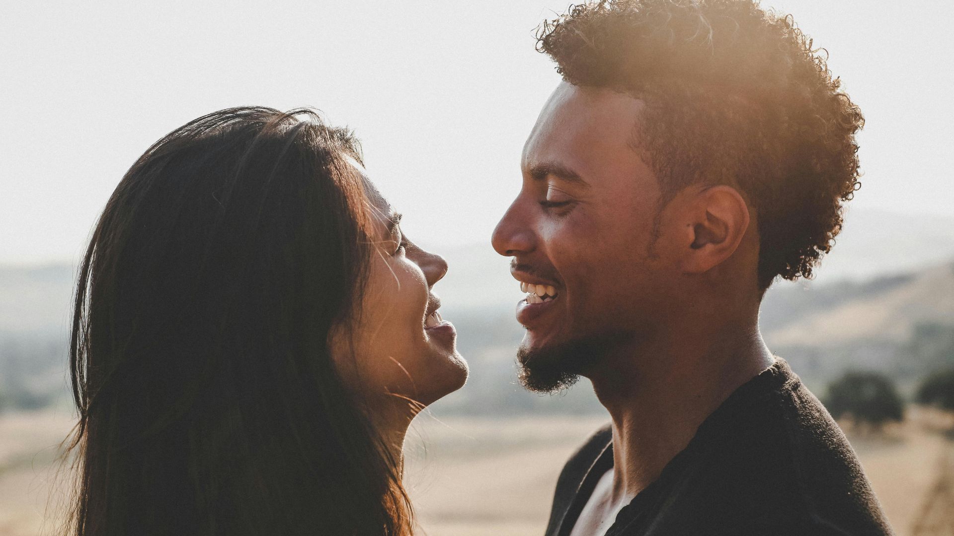 man and woman facing