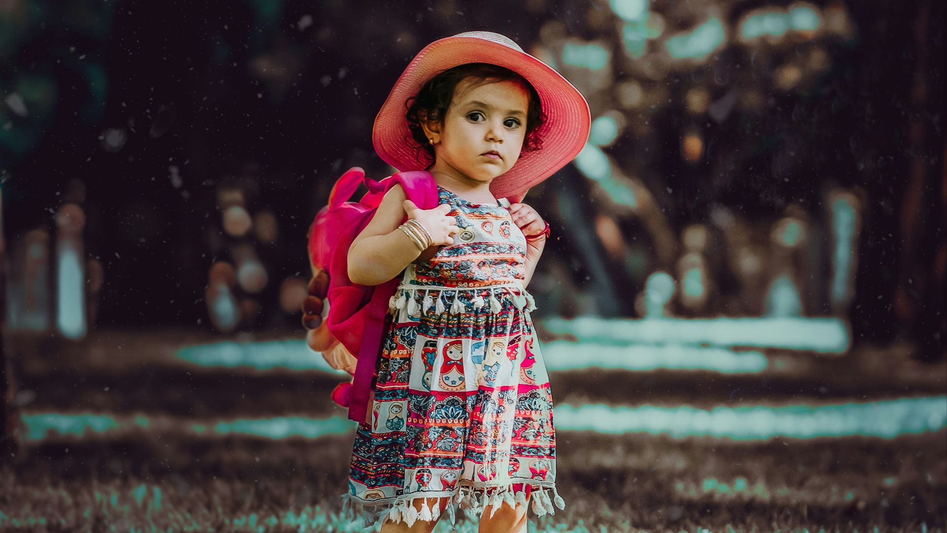 toddler carrying backpack