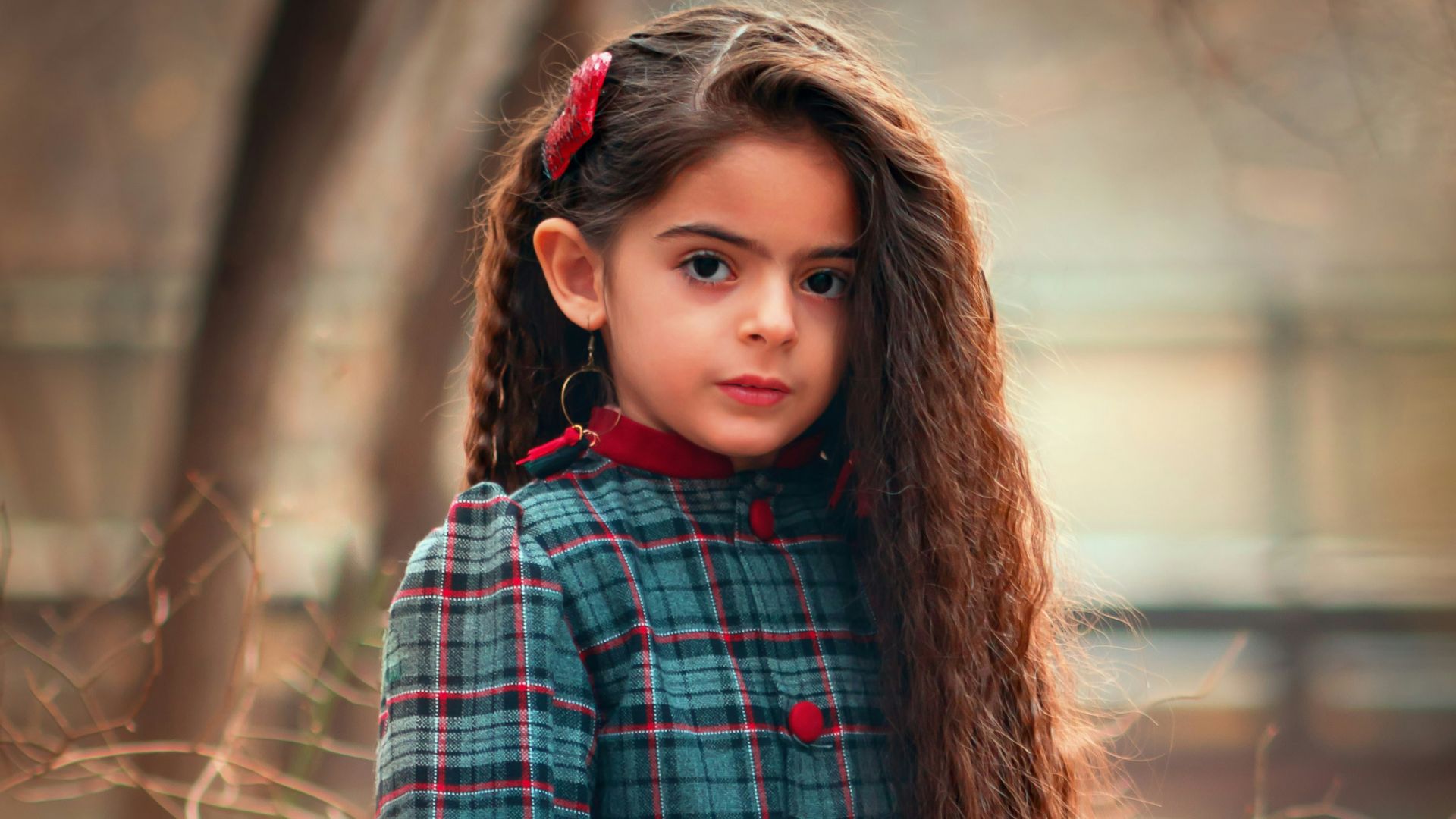 girl standing near tree