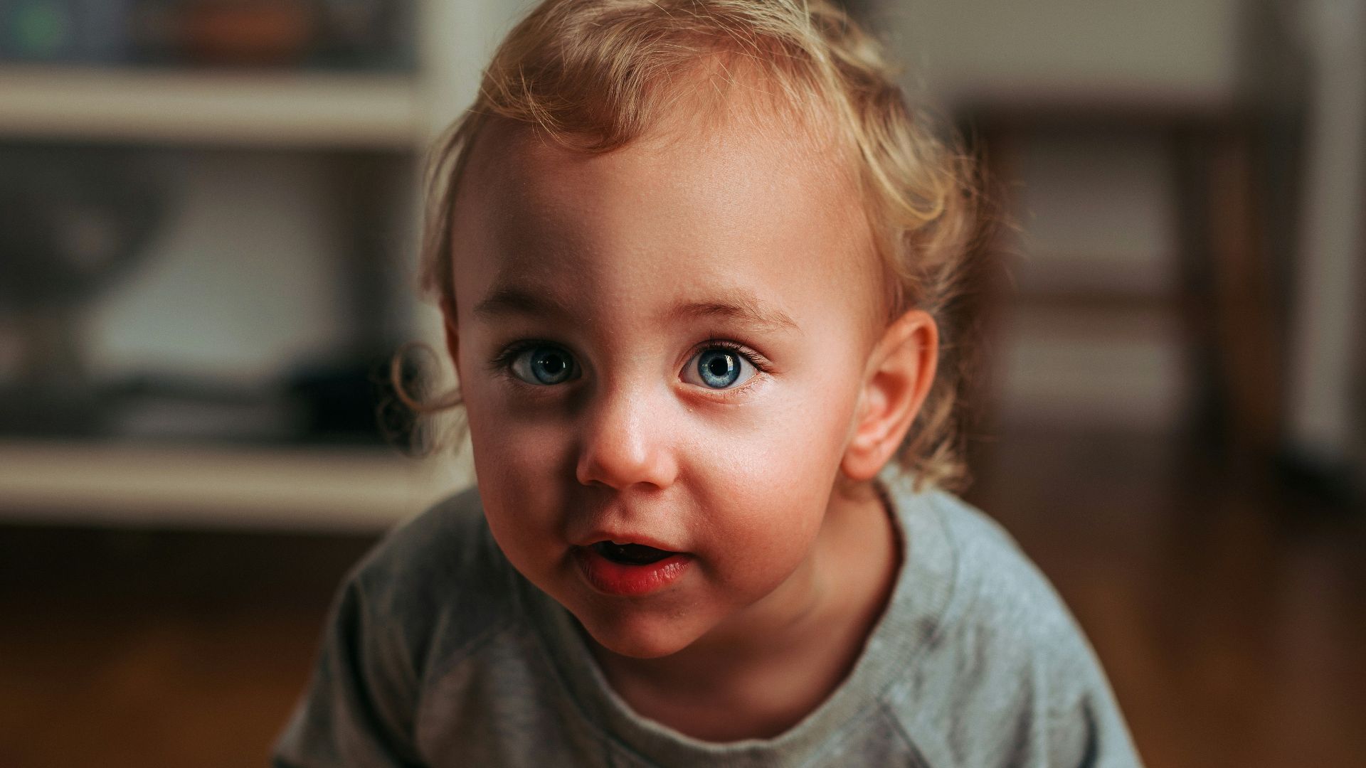 boy holding his knee
