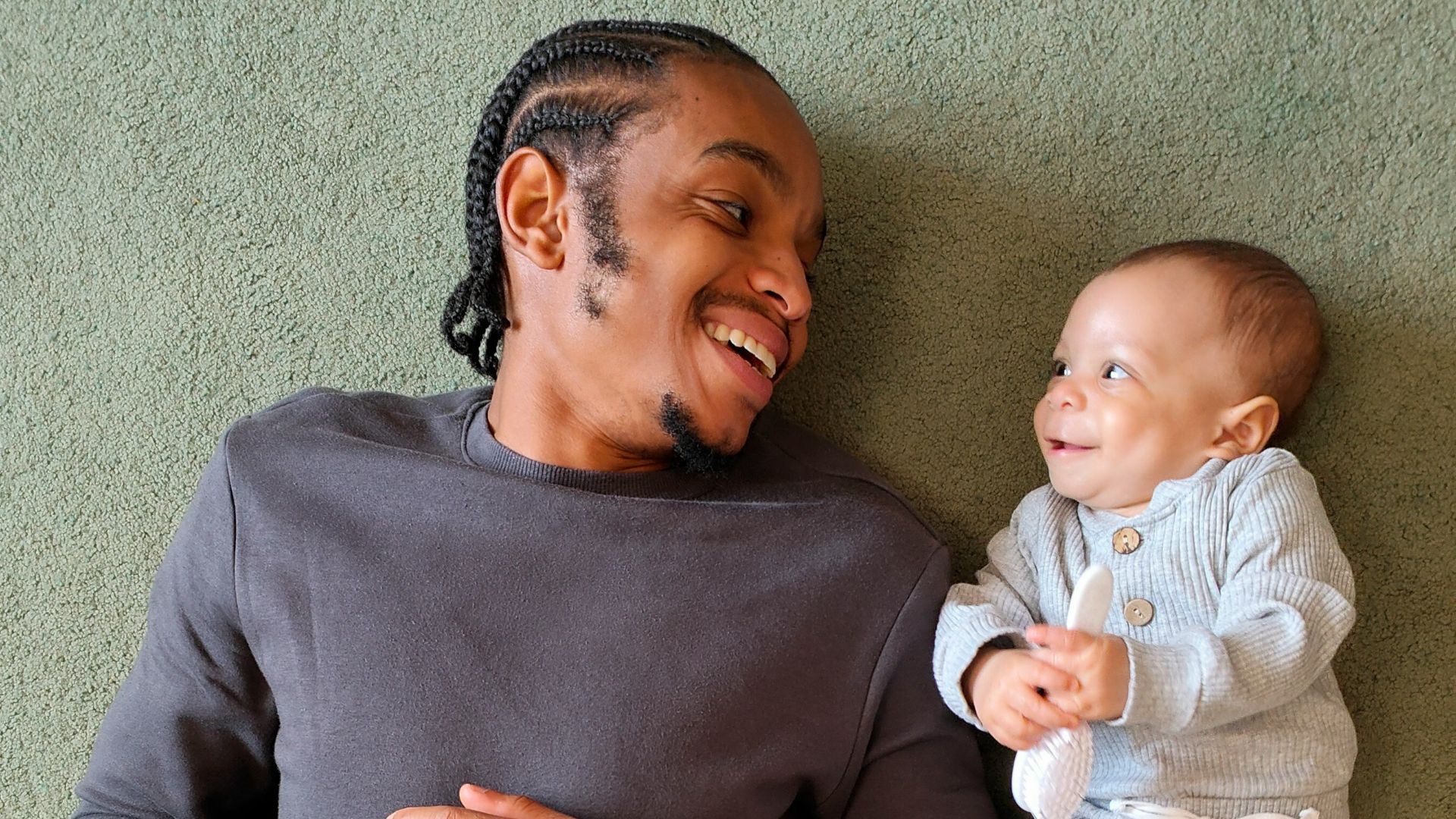 a person holding a baby