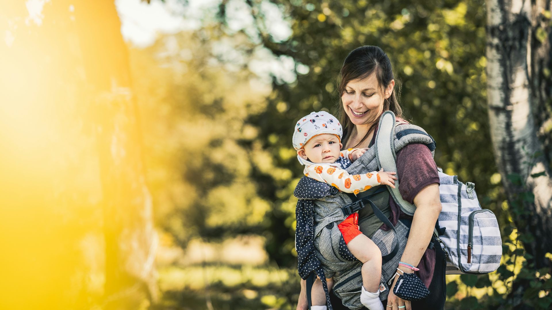 a woman holding a child in her arms