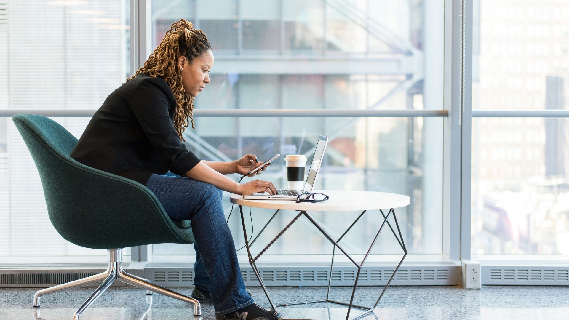 women's black elbow-sleeved blouse