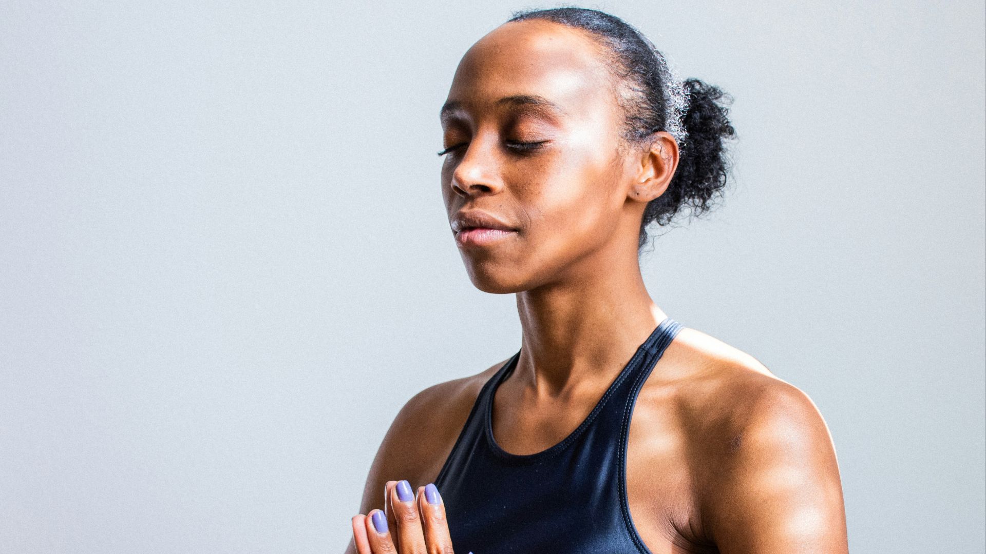 woman wearing black sports bra