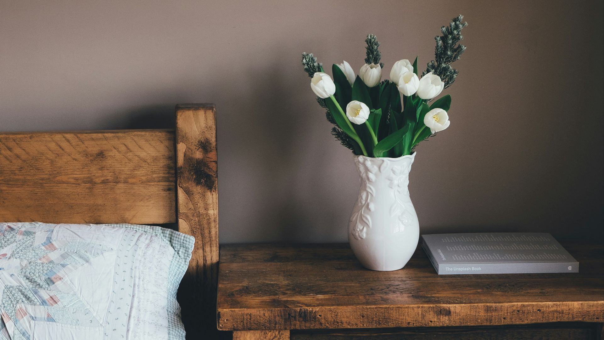 white flower vase on surface