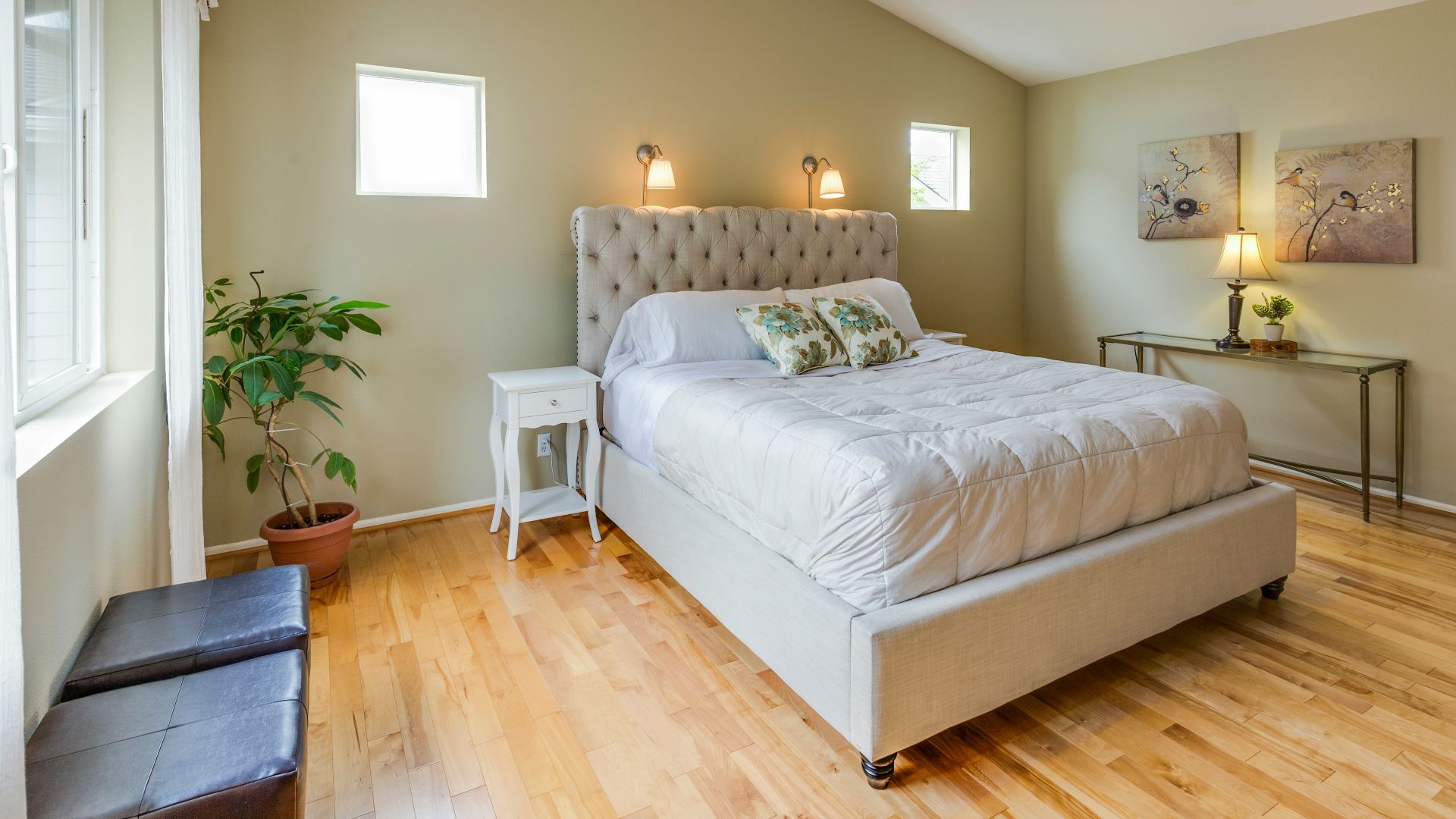 tufted white upholstered bed