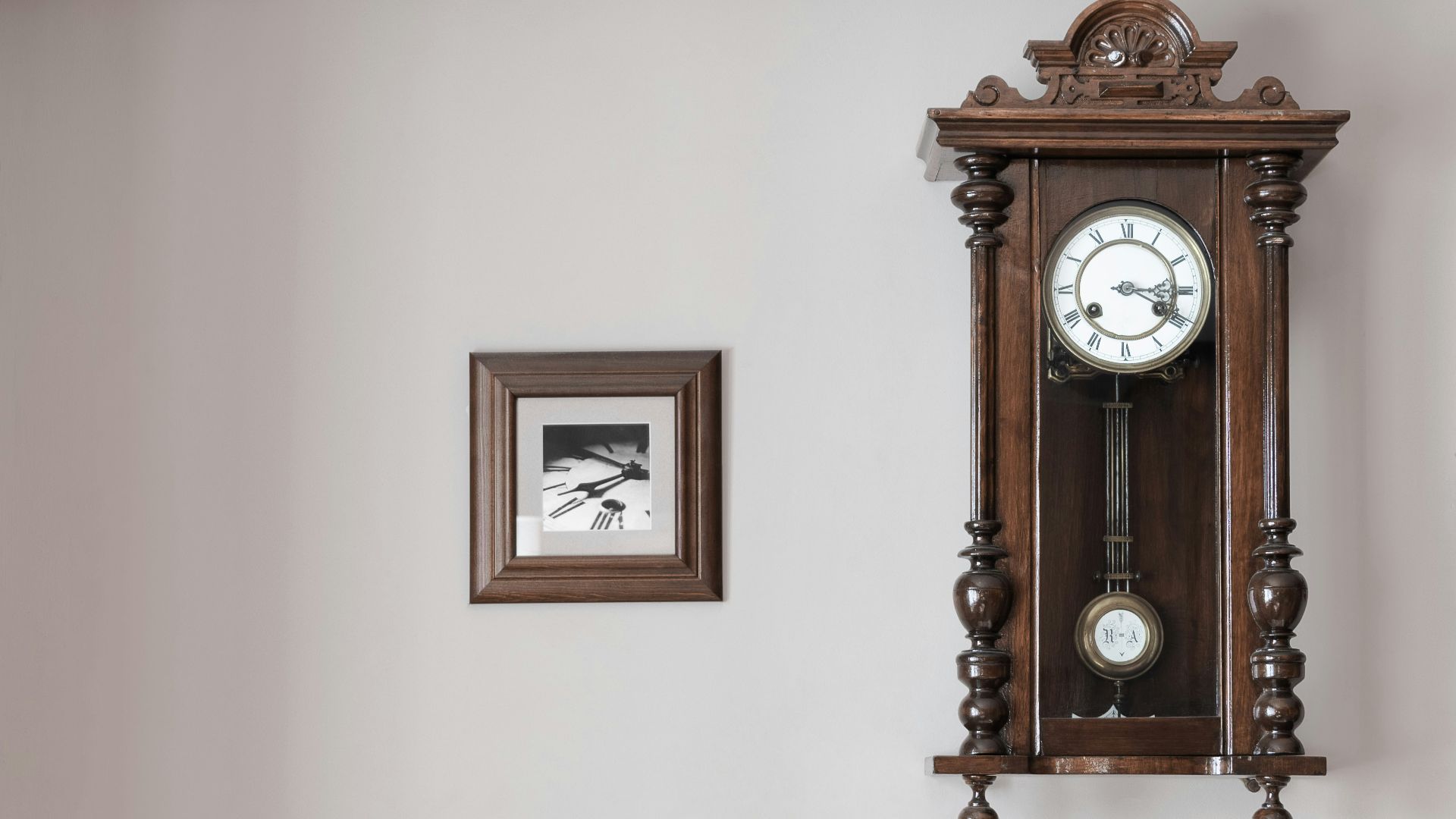 brown pendulum clock