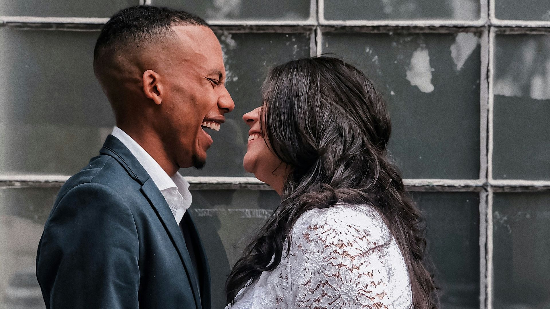 a man and a woman standing next to each other