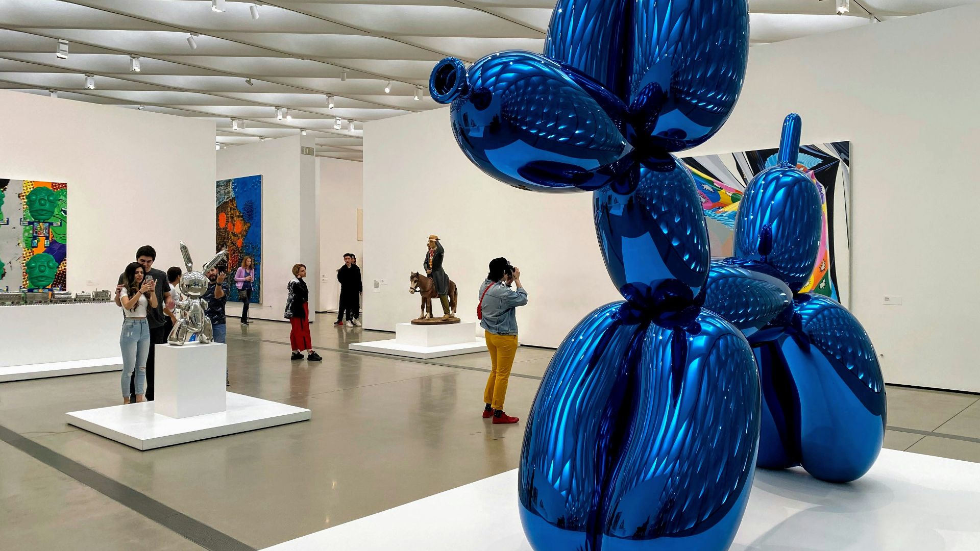 blue balloon on white floor