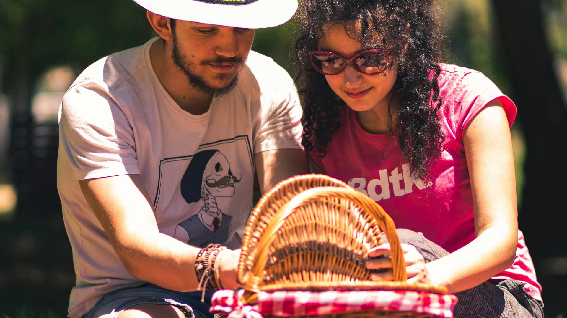 woman in white shirt sitting beside woman in white shirt