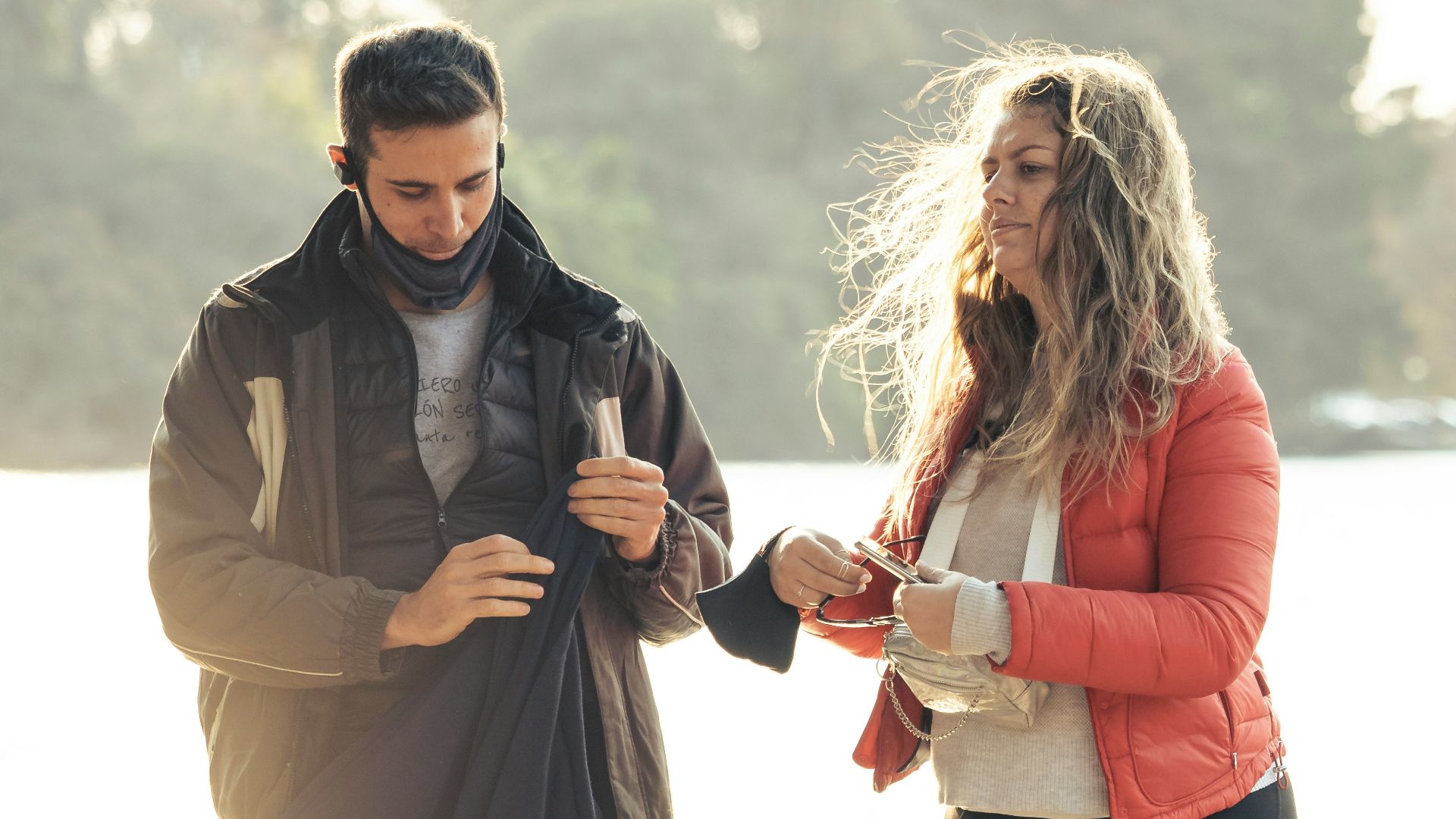 a man and a woman standing next to each other