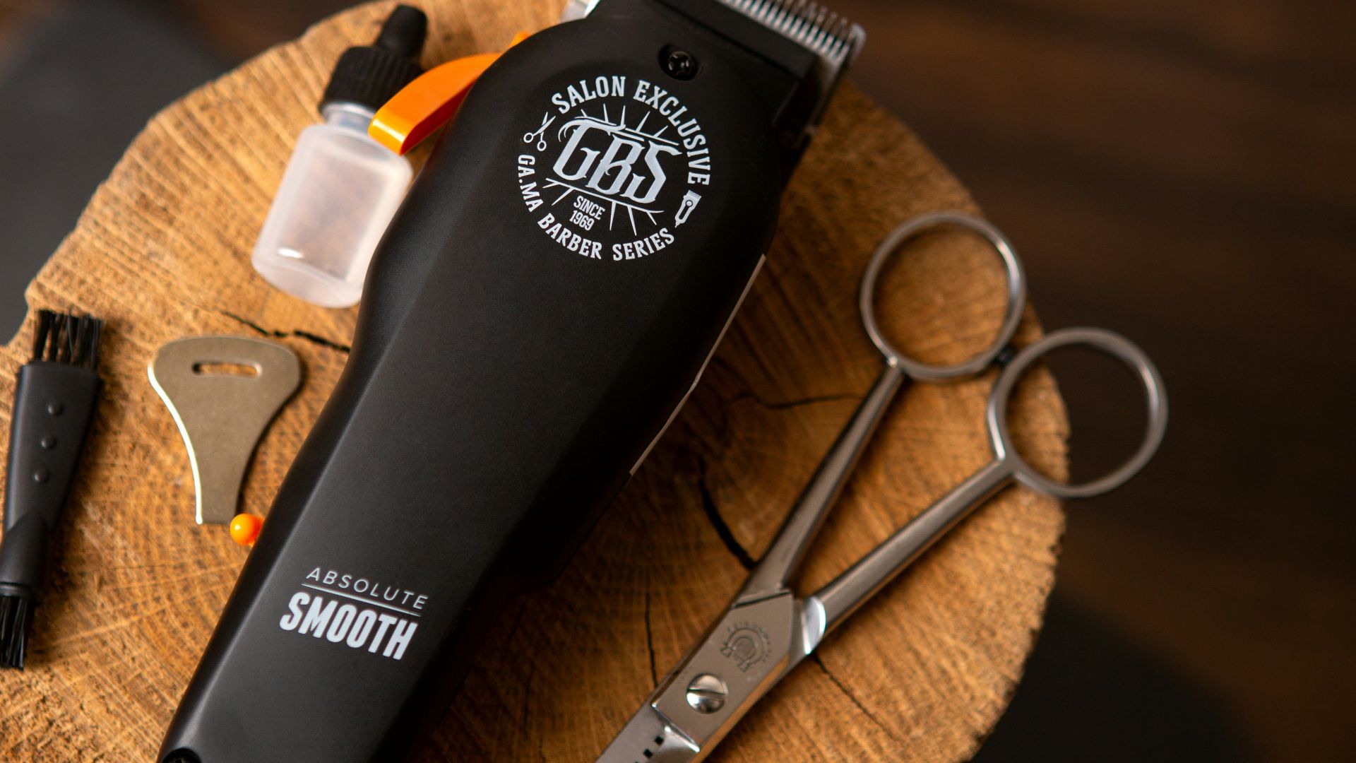 black and silver scissors beside silver scissors