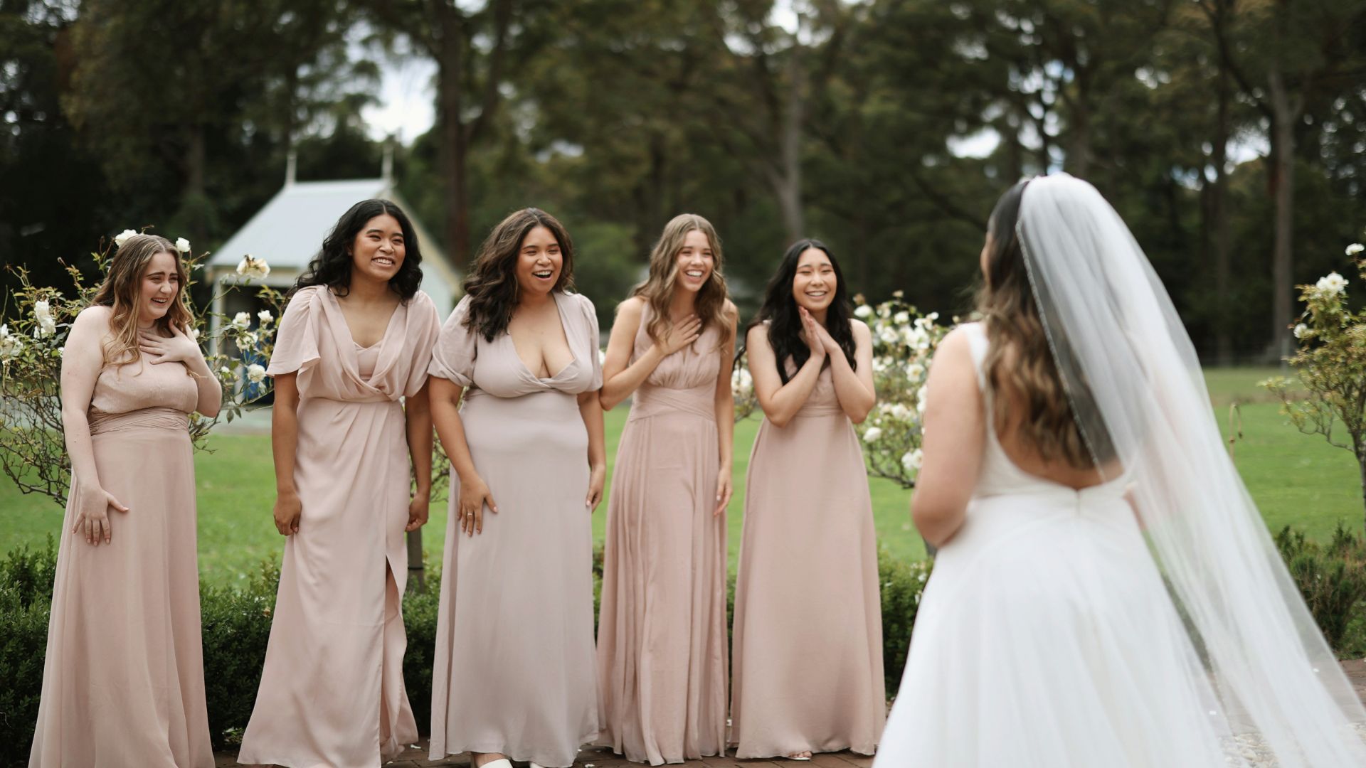 a group of women standing next to each other