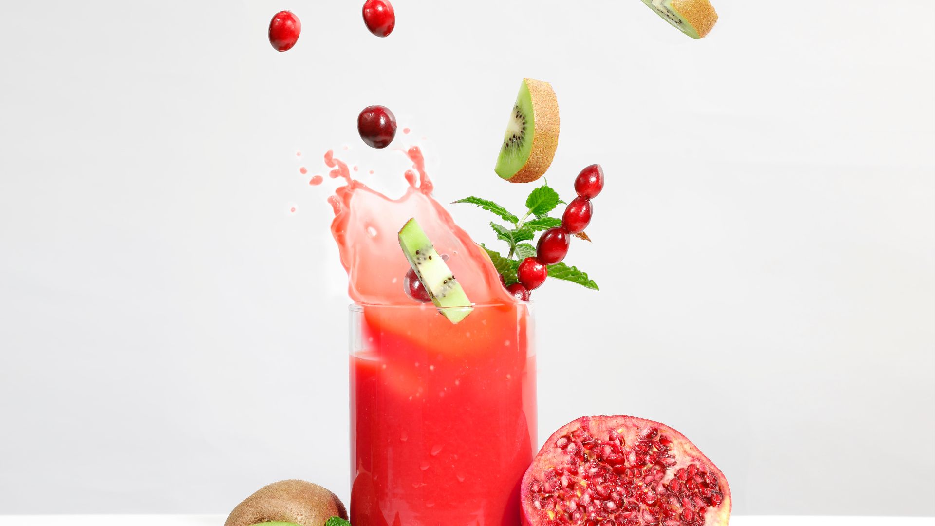 strawberry juice in clear drinking glass