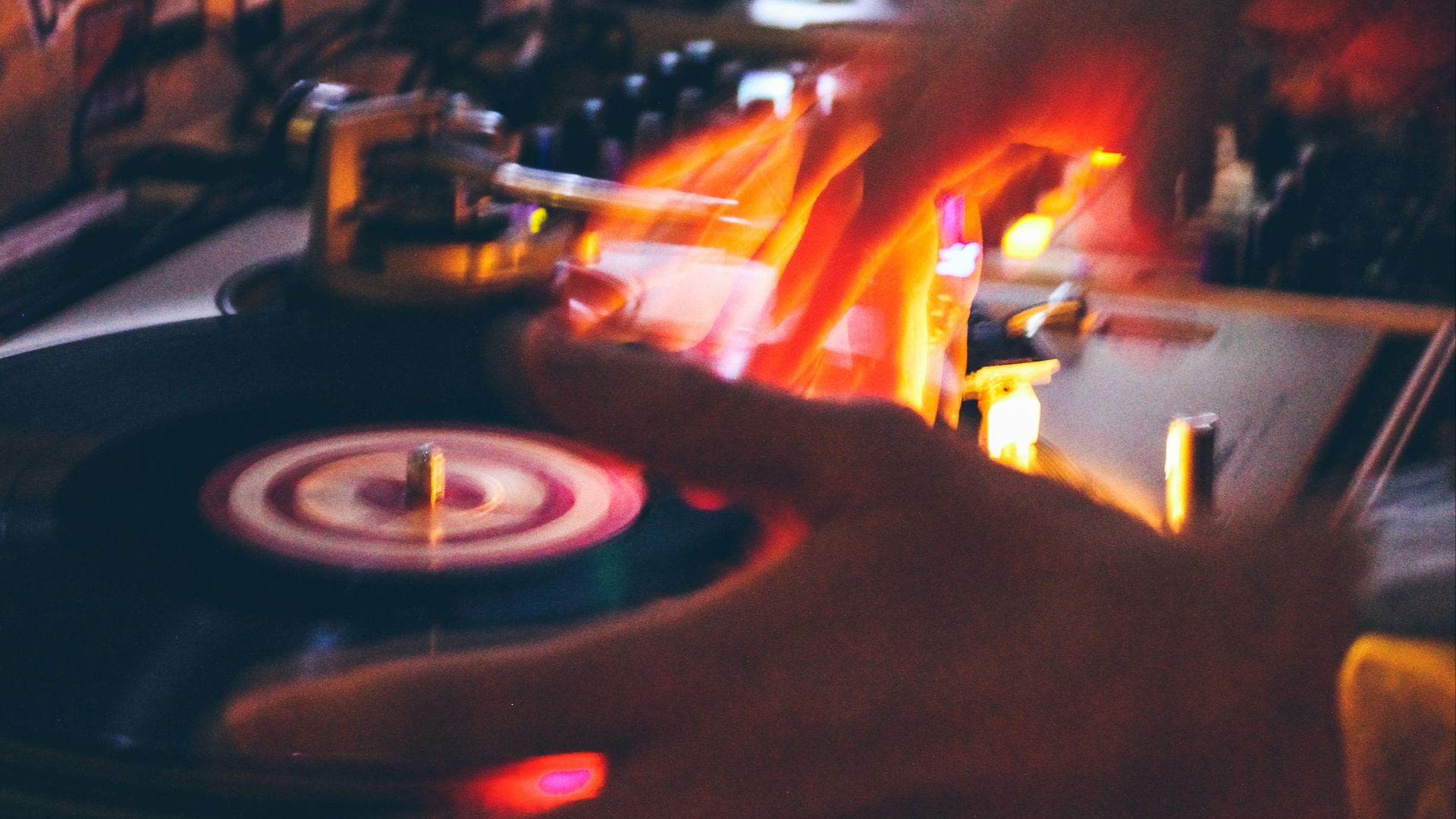person holding black and grey DJ turntable