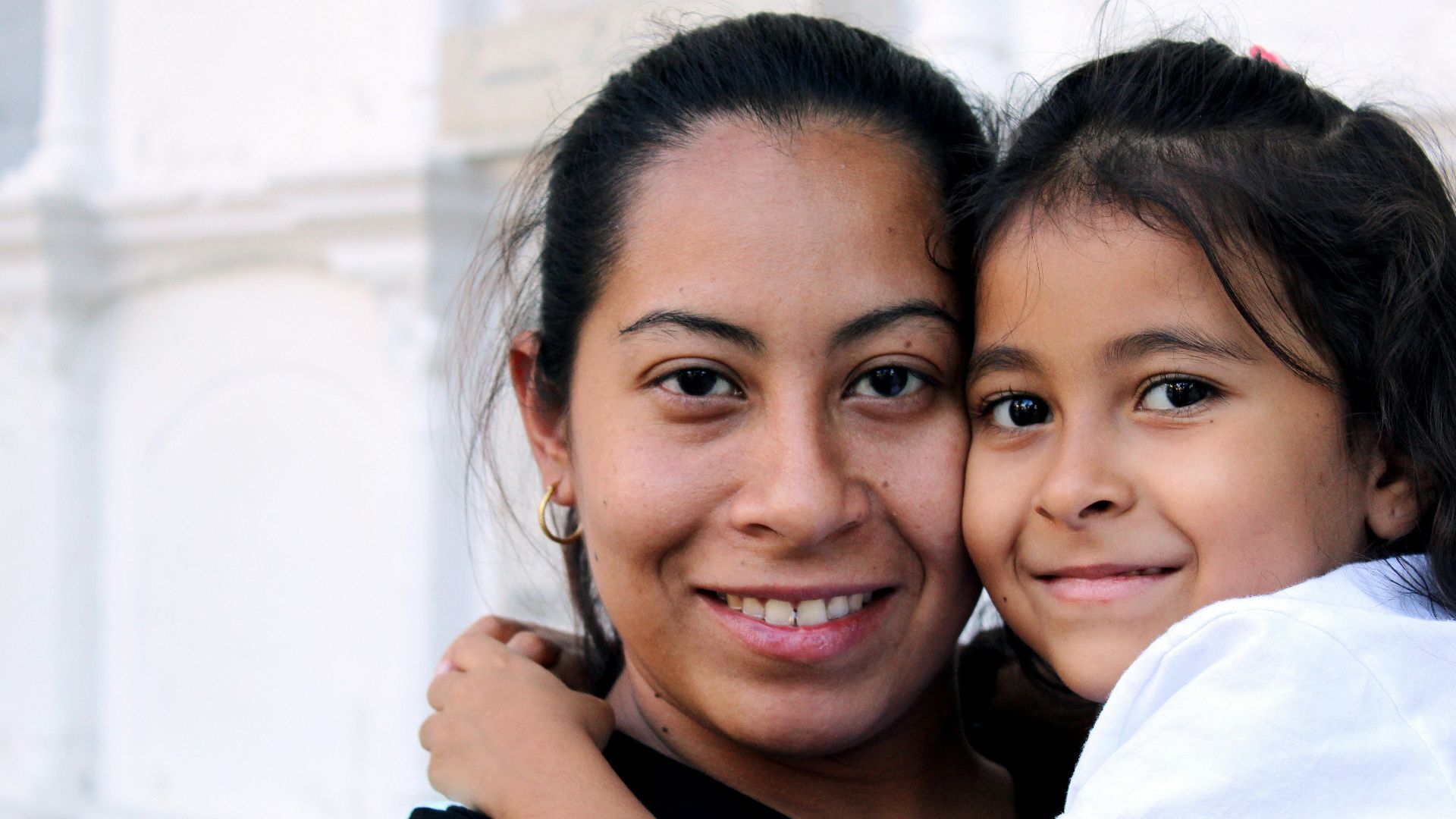 woman standing near wall