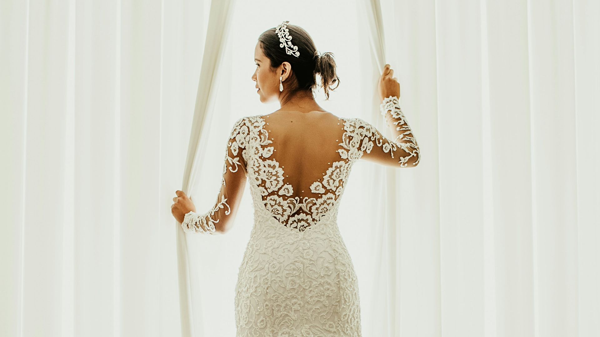 woman in white floral wedding dress