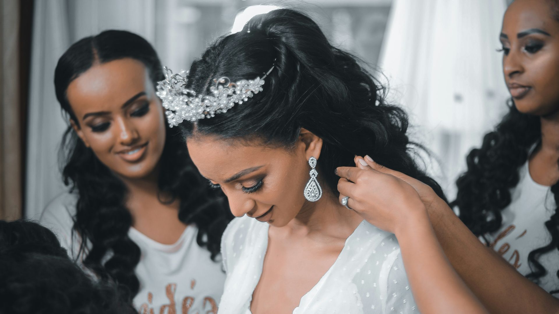 woman in white lace dress smiling