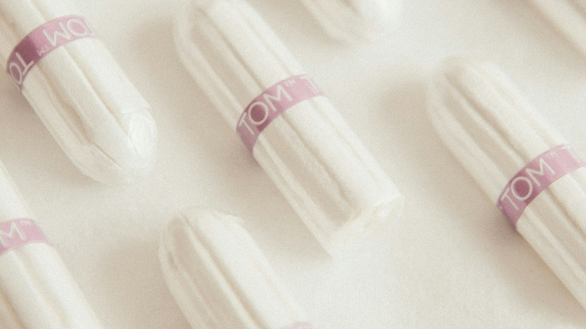 white and pink plastic tube