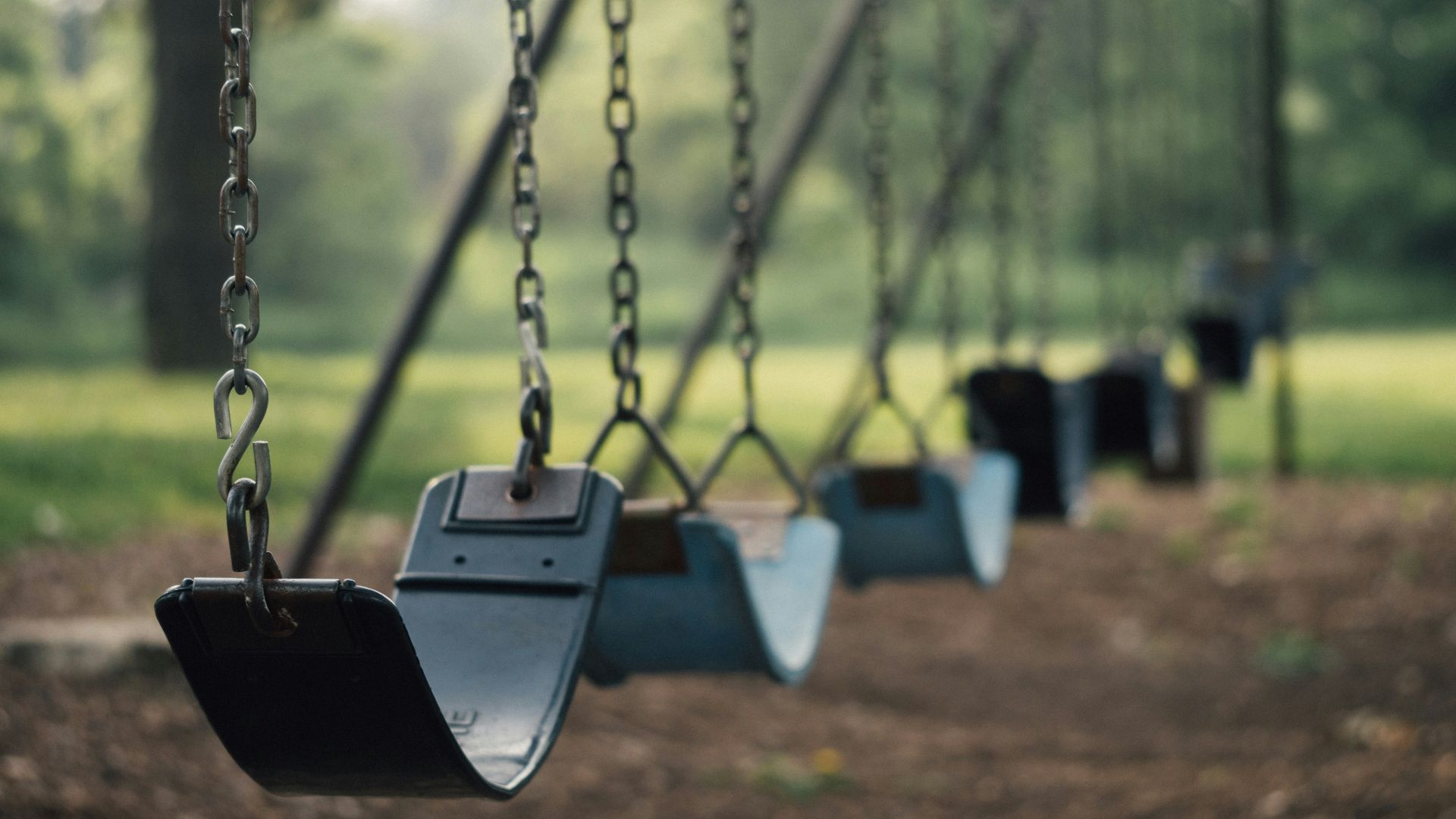 selective focus shot of outdoor swing