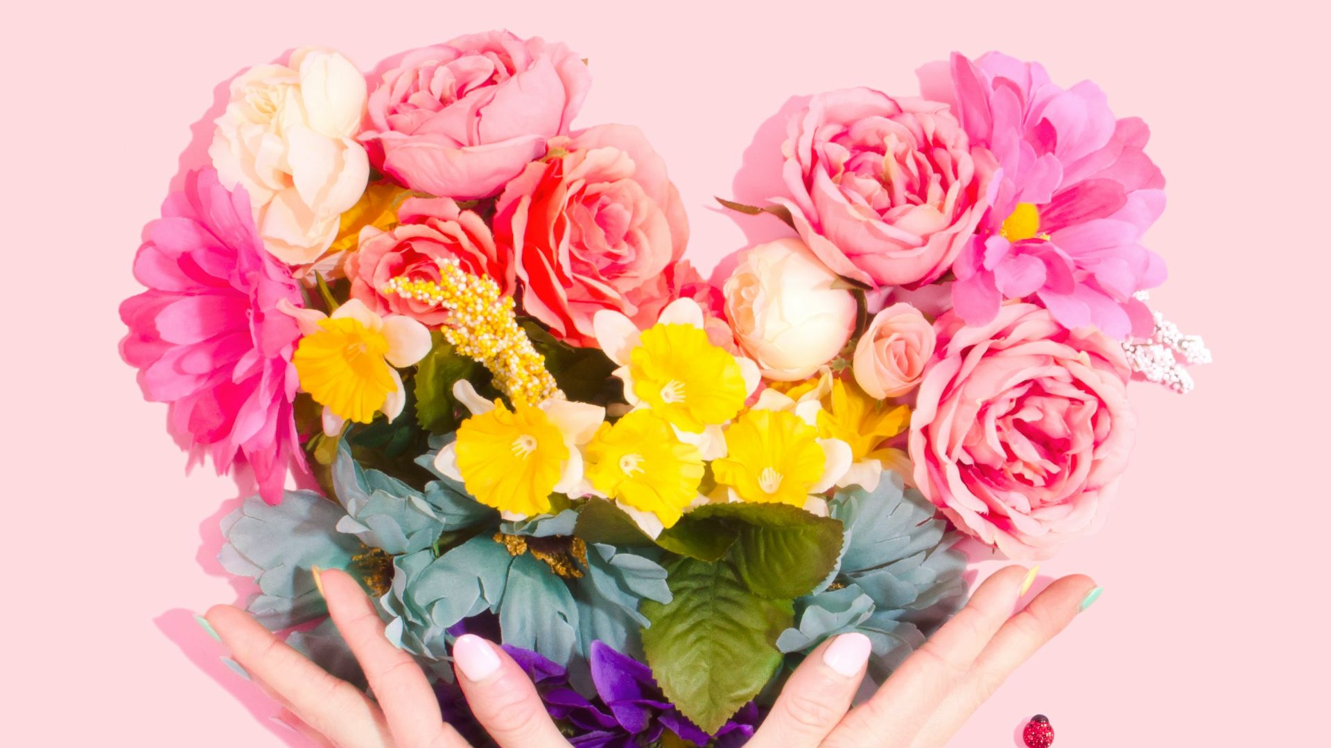 person holding bouquet of flower