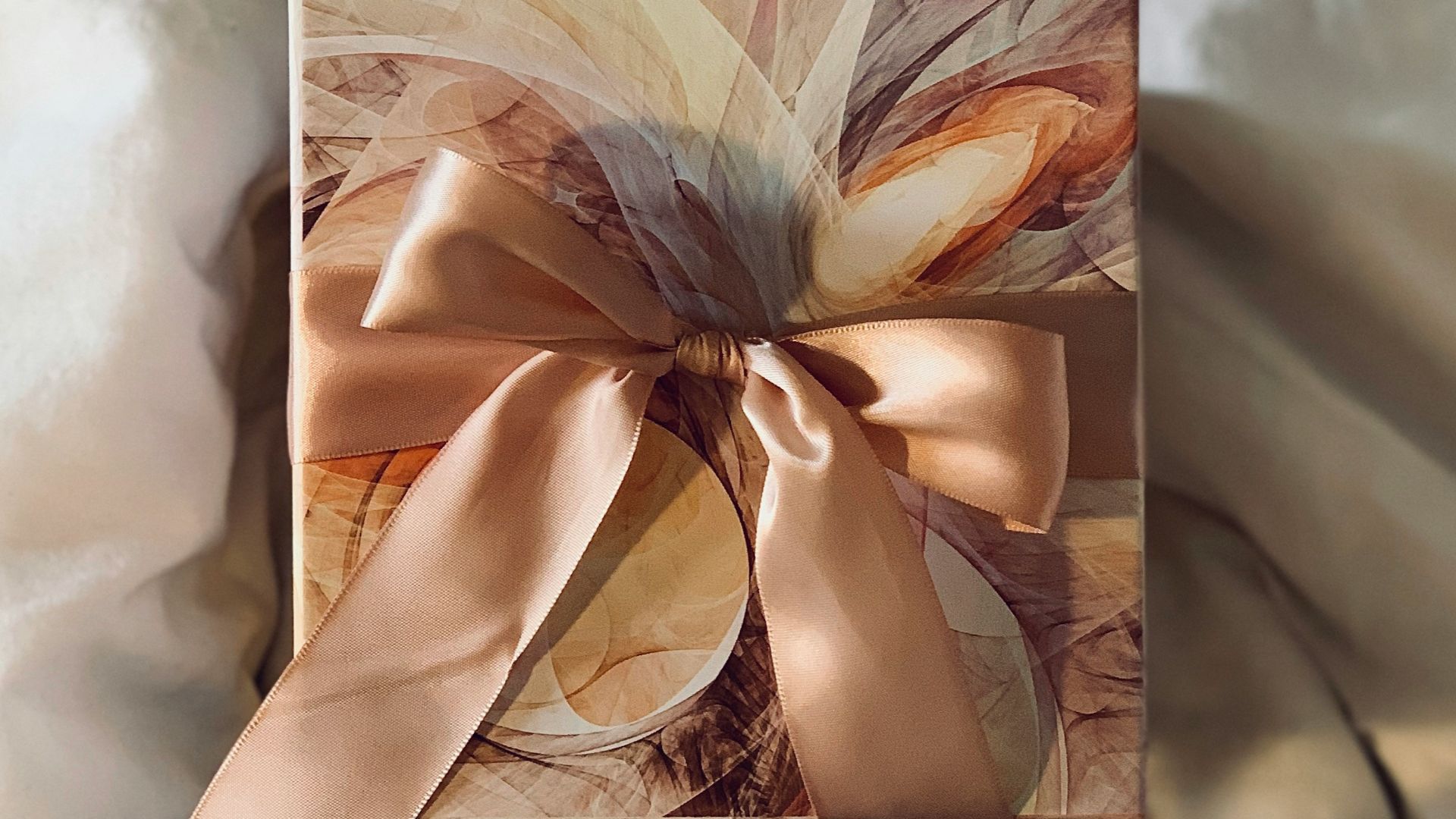 white and brown floral paper on white textile