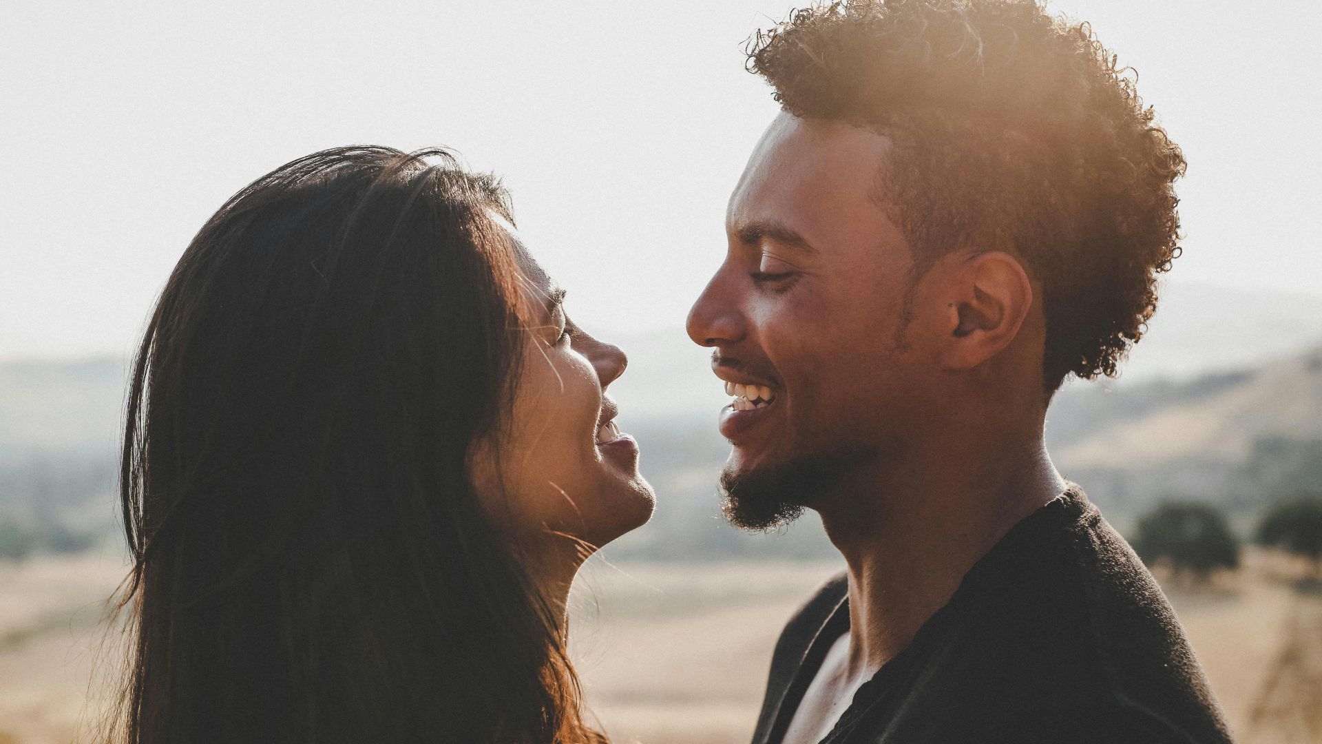 man and woman facing