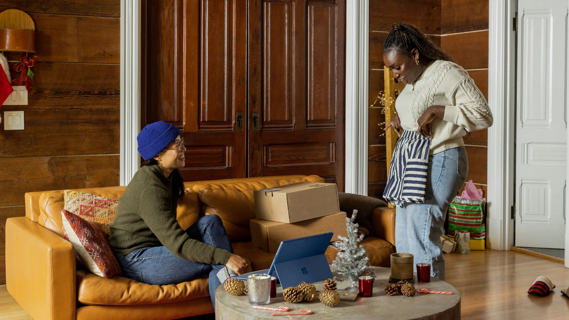 a group of people sitting around a living room