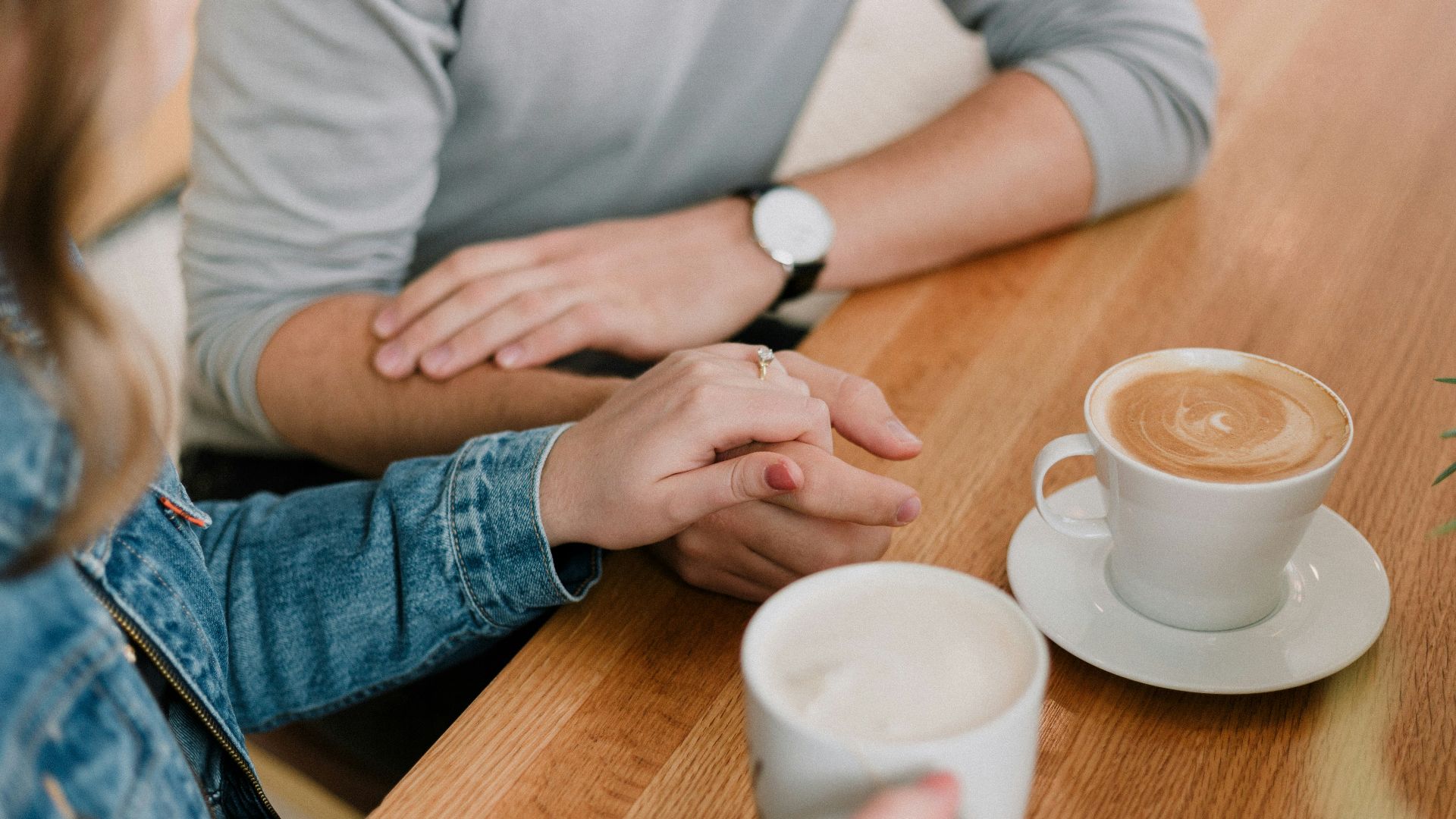 man and woman holding hands