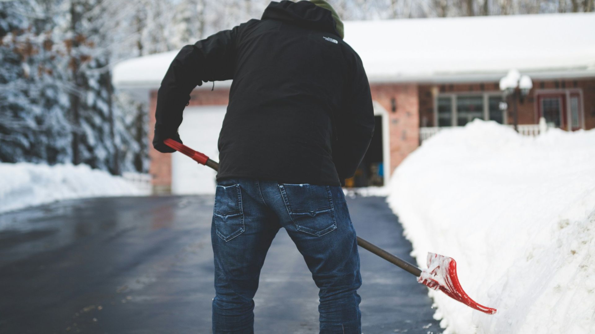person shoveling snow