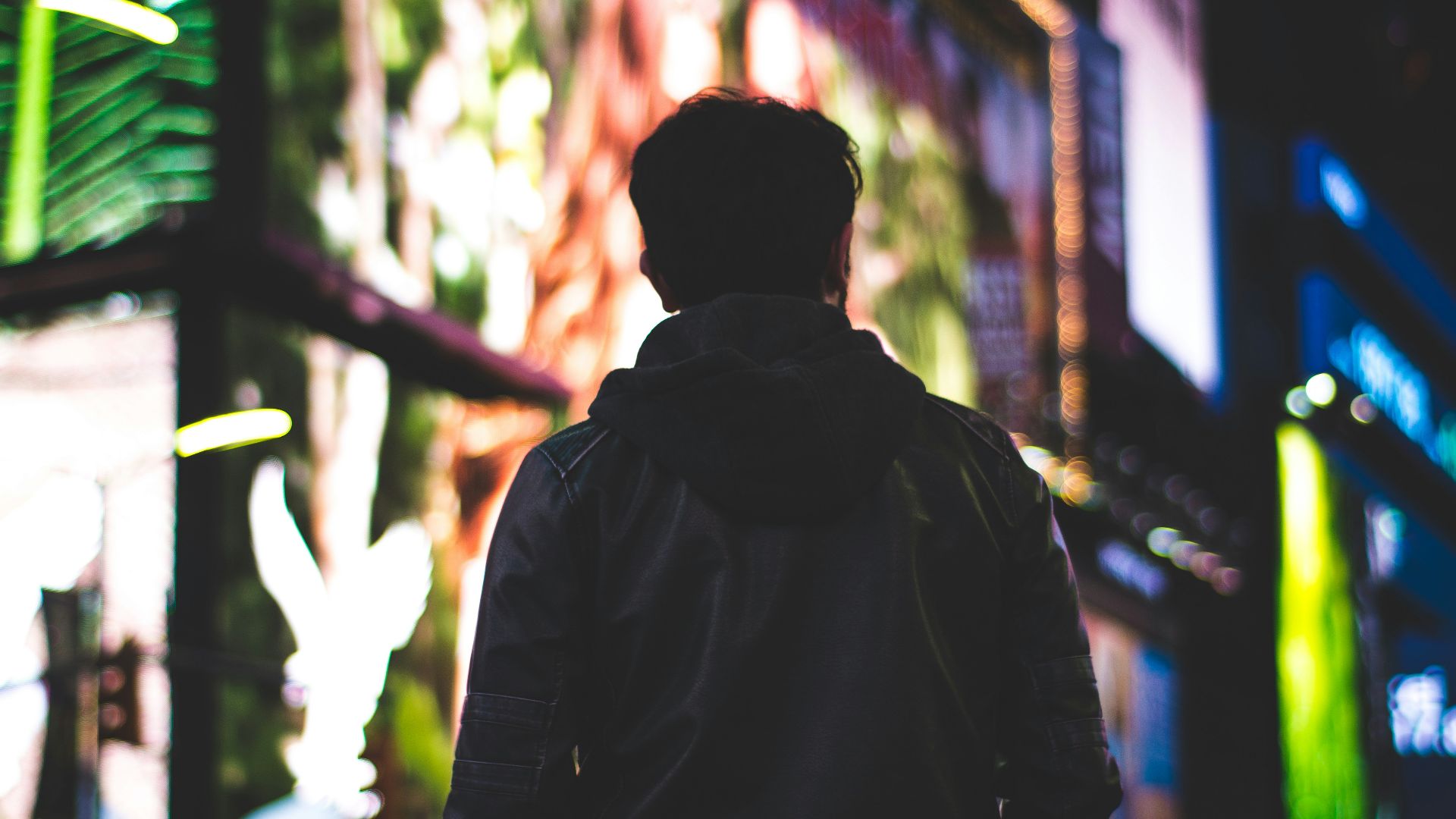 closeup photo of man wearing black hoodie jacket