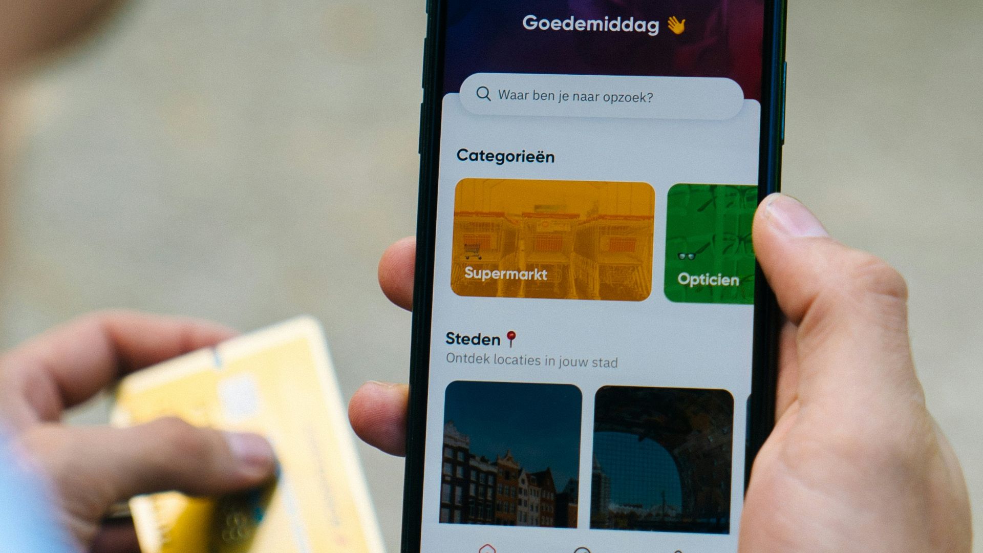 person holding white iphone 5 c