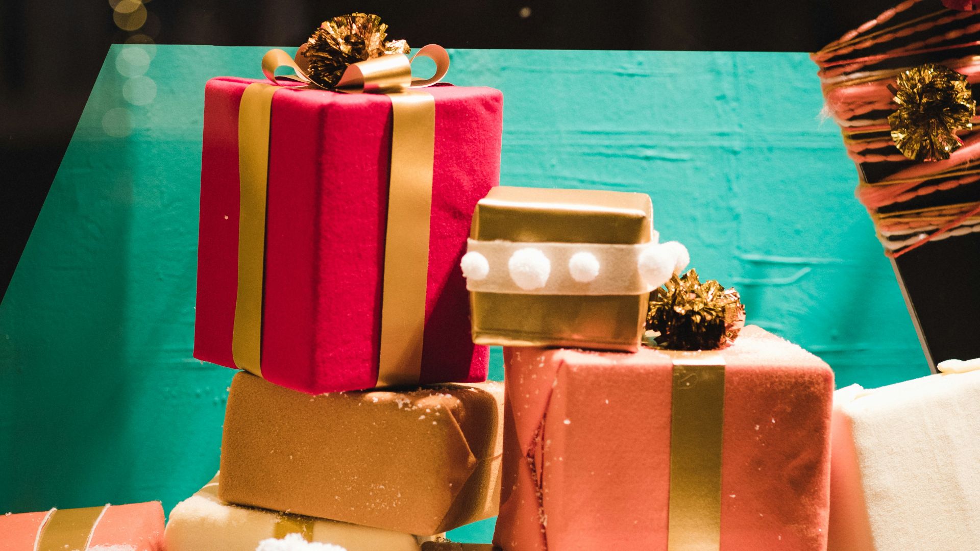 pile of gift boxes beside wall