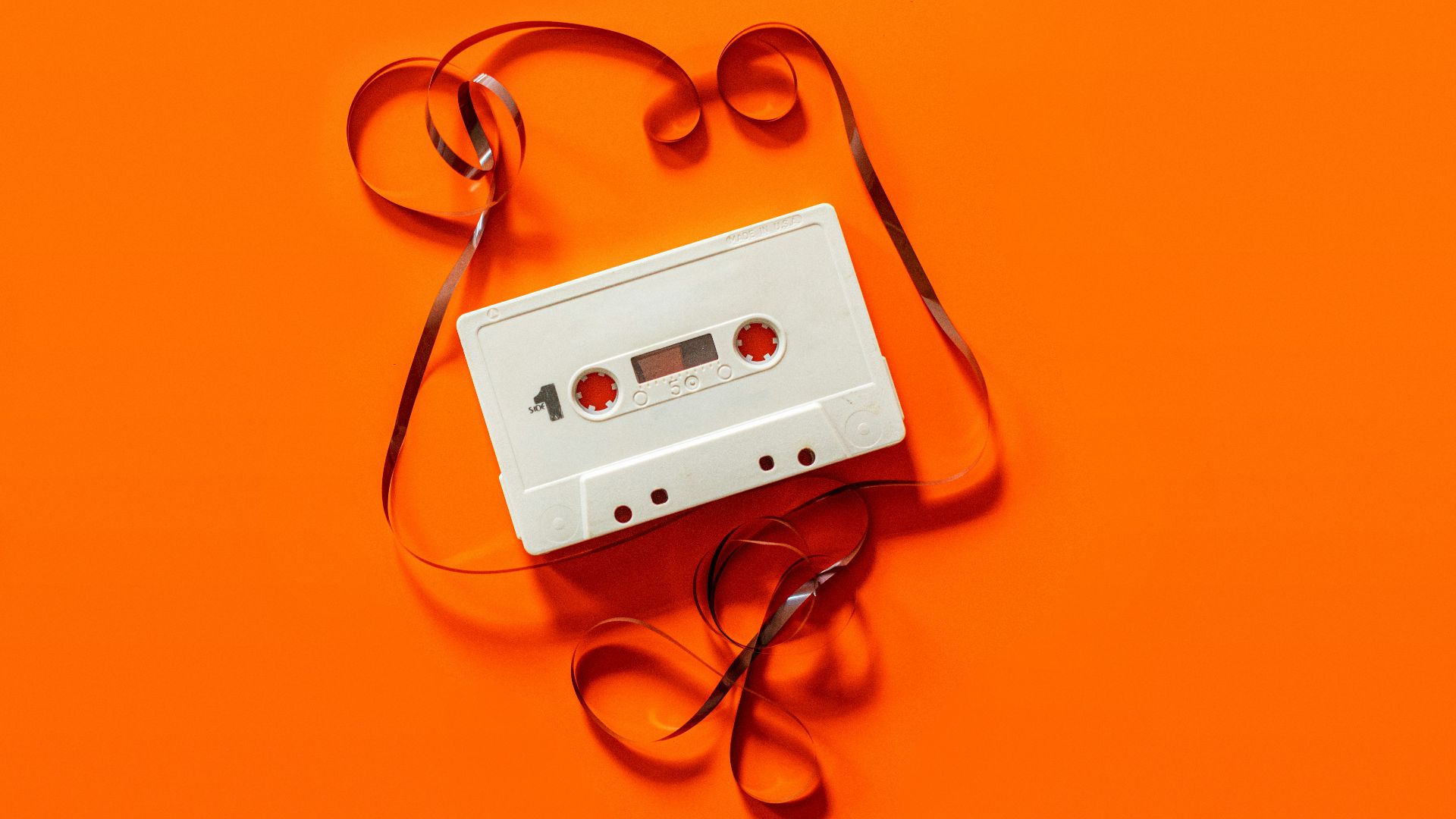 white cassette tape close-up photography