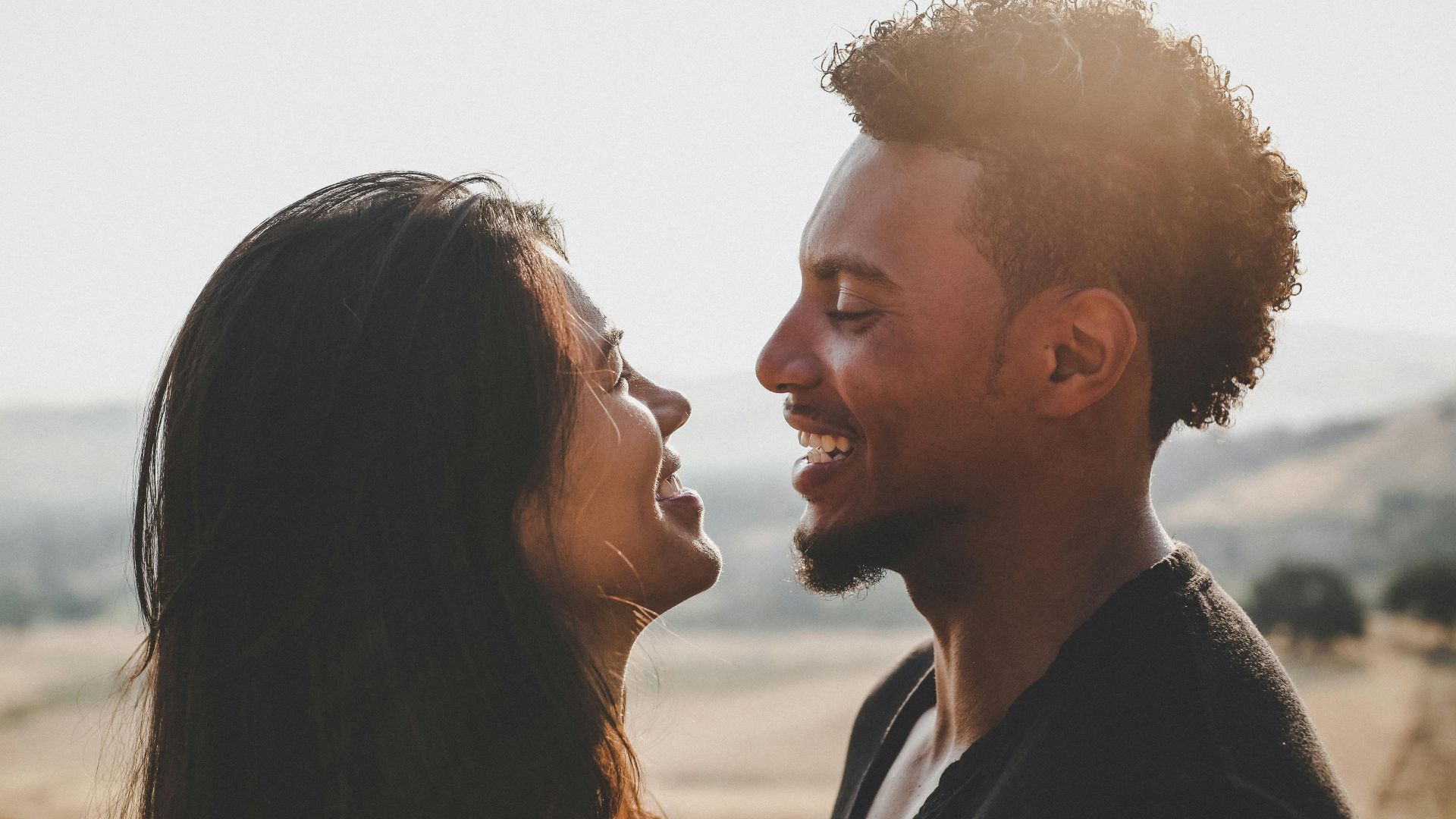 man and woman facing