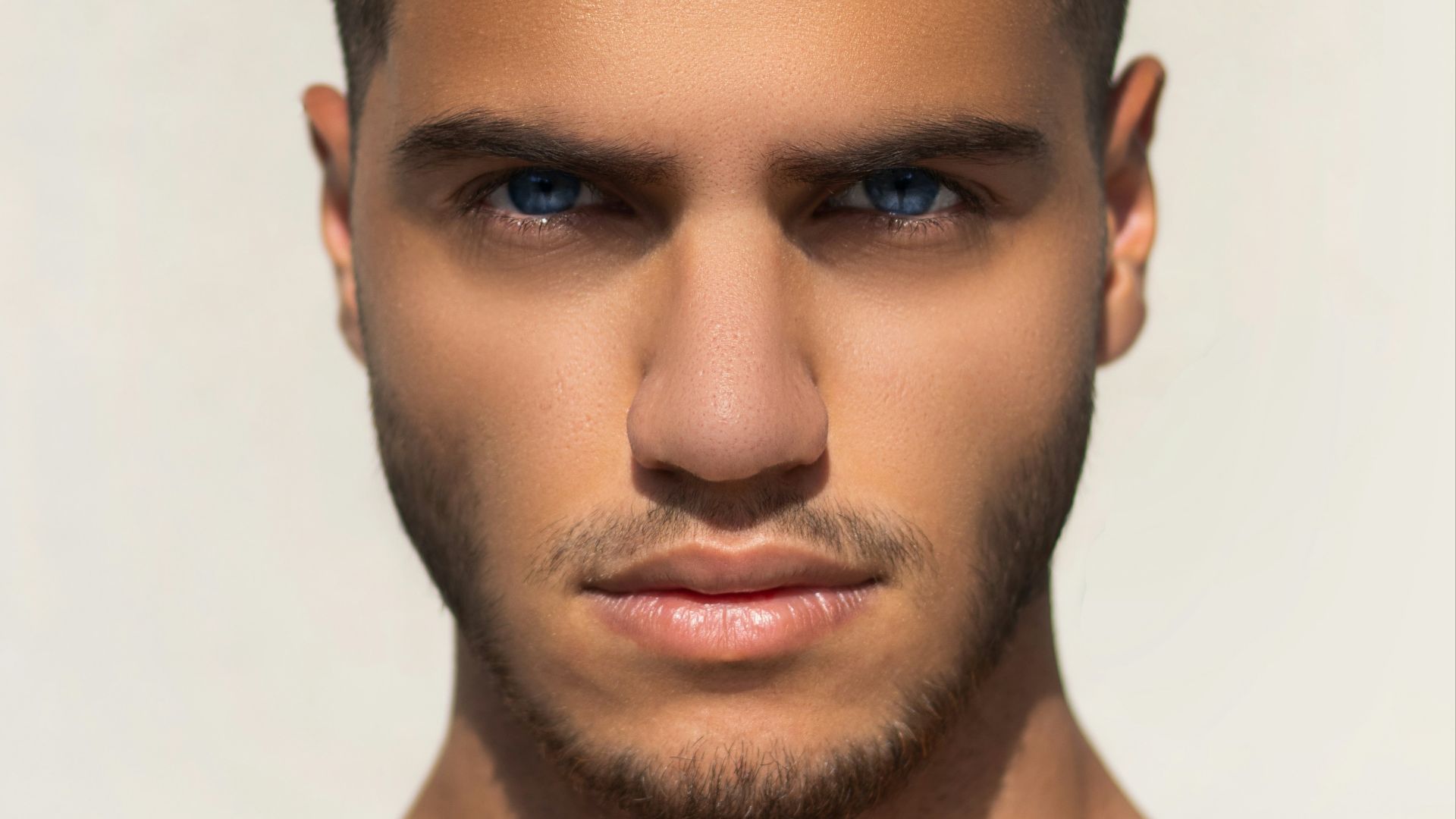 man in silver chain necklace